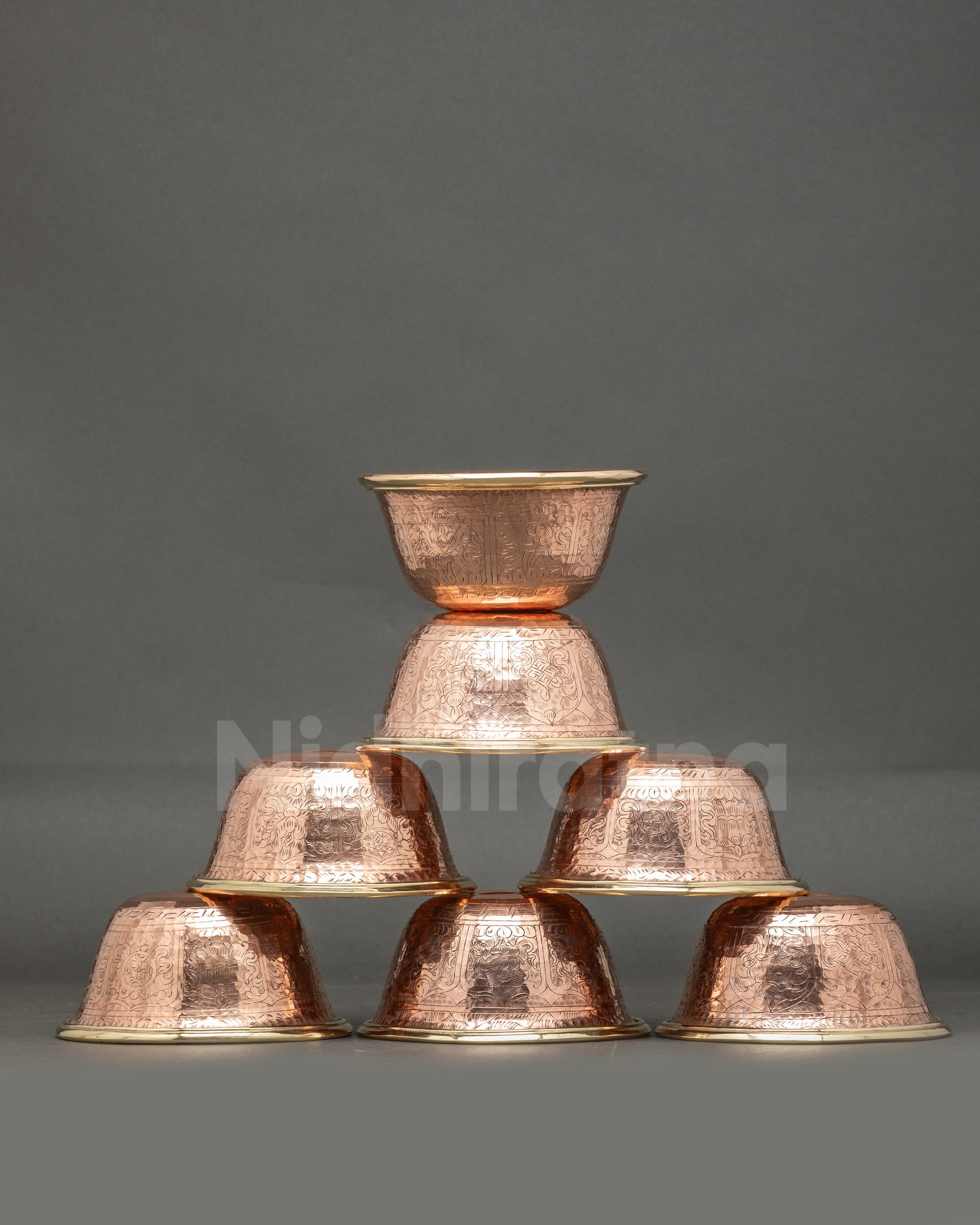 Front view seven bowl water offering set handmade copper Tibetan Buddhist altar set