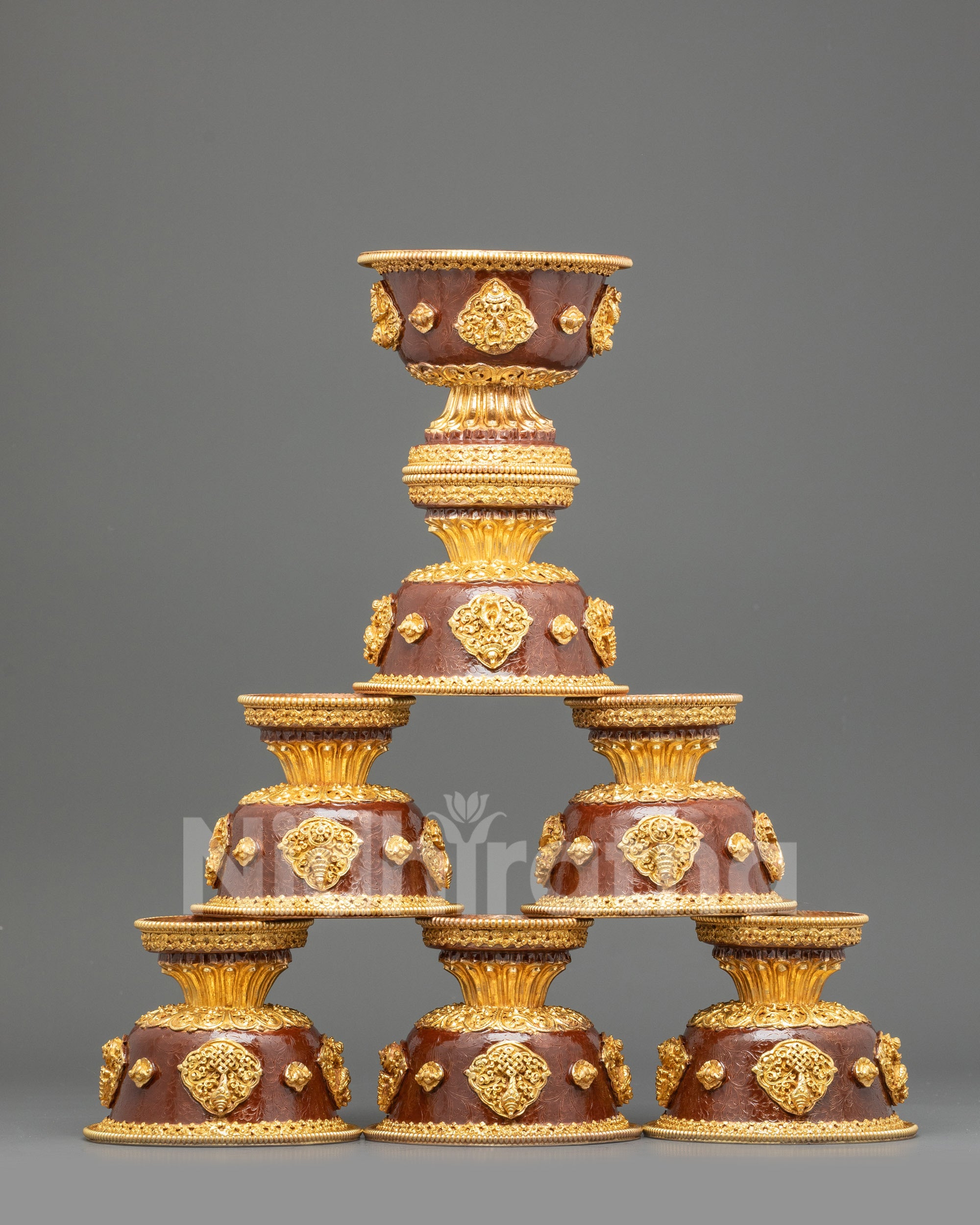 Front view seven sets of gold-plated Tibetan water offering bowls on pedestal for Buddhist altar