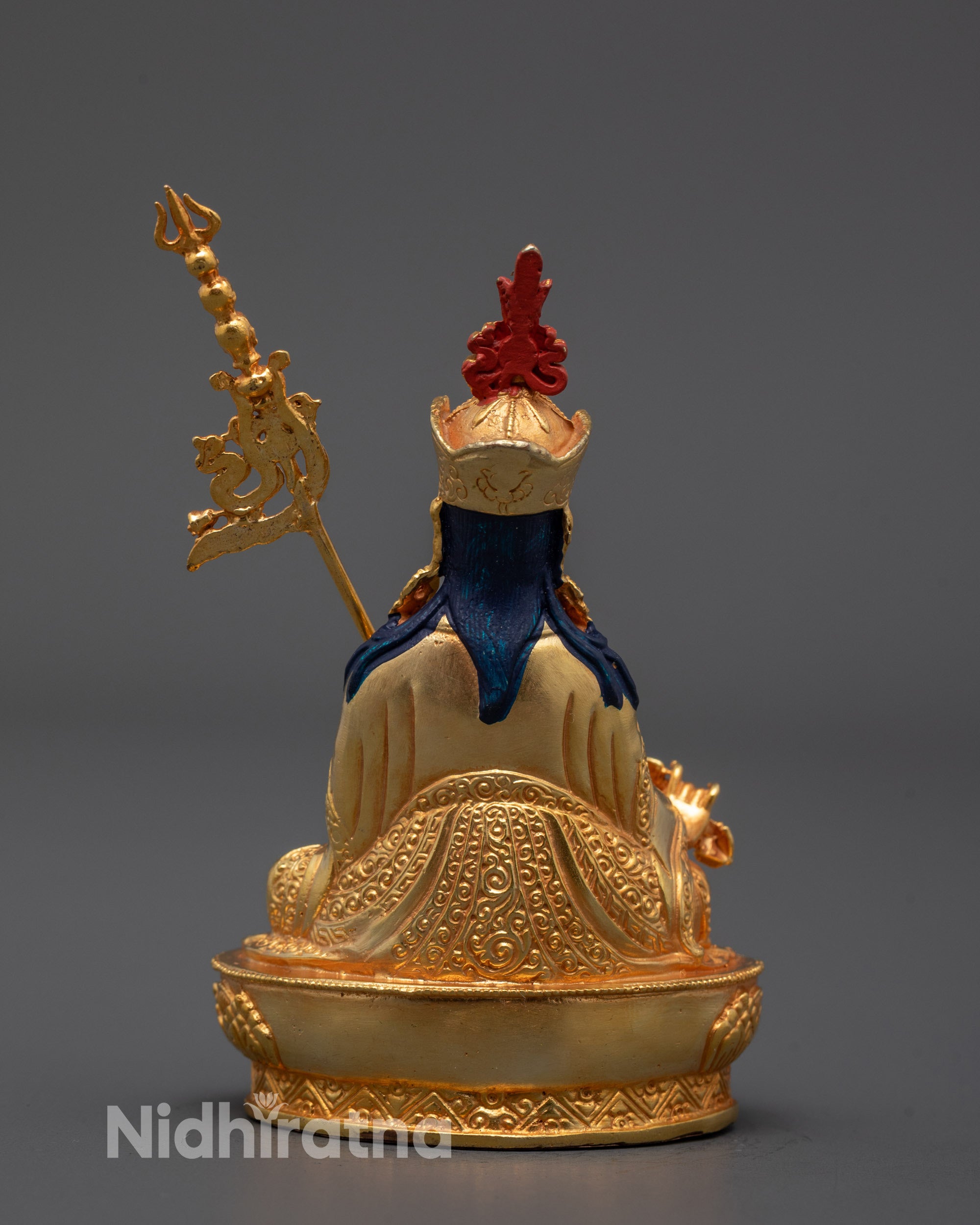 Full-body image of 24k gold-finished Padmasambhava statue showcasing traditional Tibetan