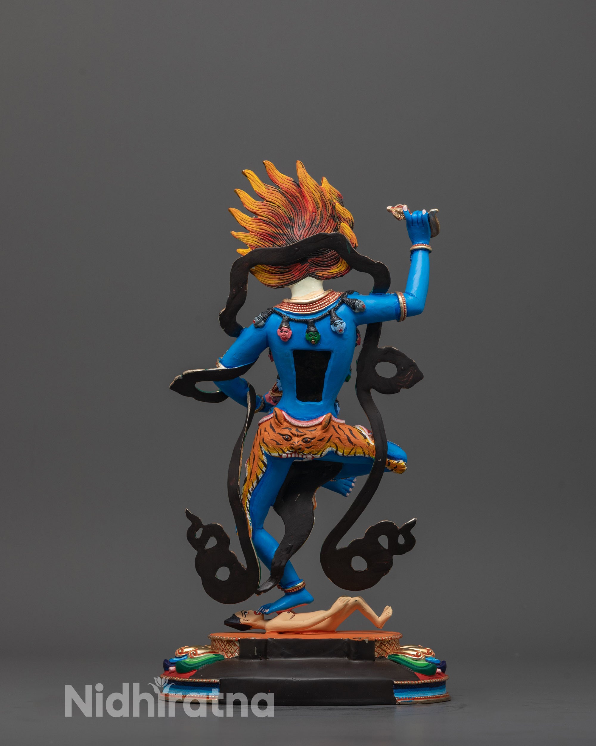 Full-body image of the handcrafted Blue Simha Mukha Statue placed