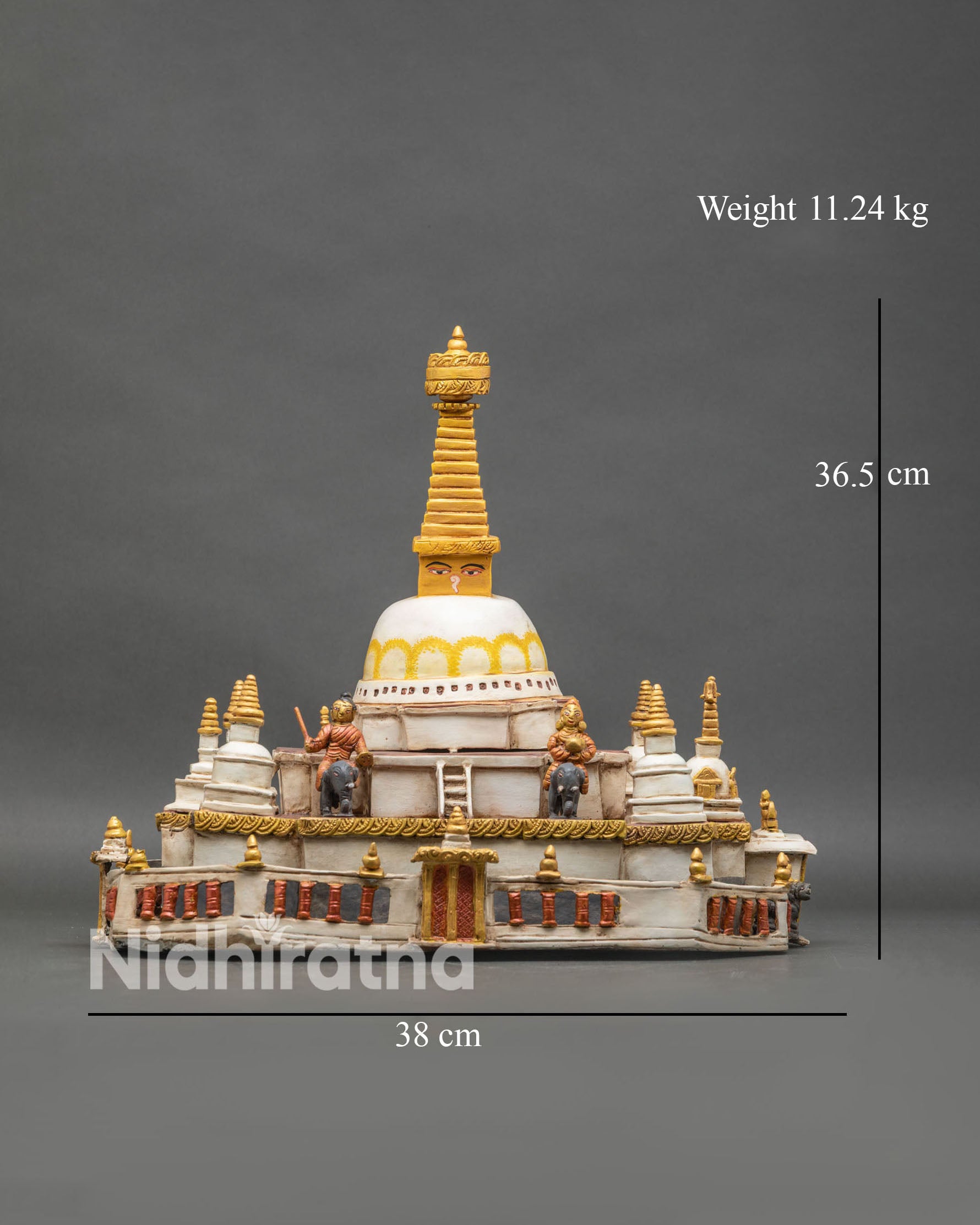 Full view of Boudha Stupa replica with golden pinnacle and mandala base detail