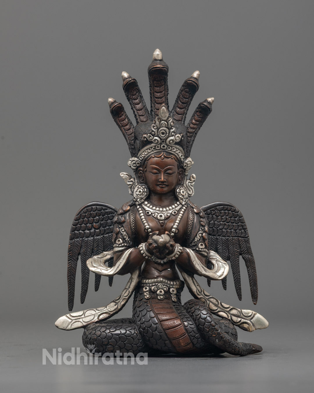Full image of Hand-carved Naga Kanya statue from Nepal featuring oxidized copper