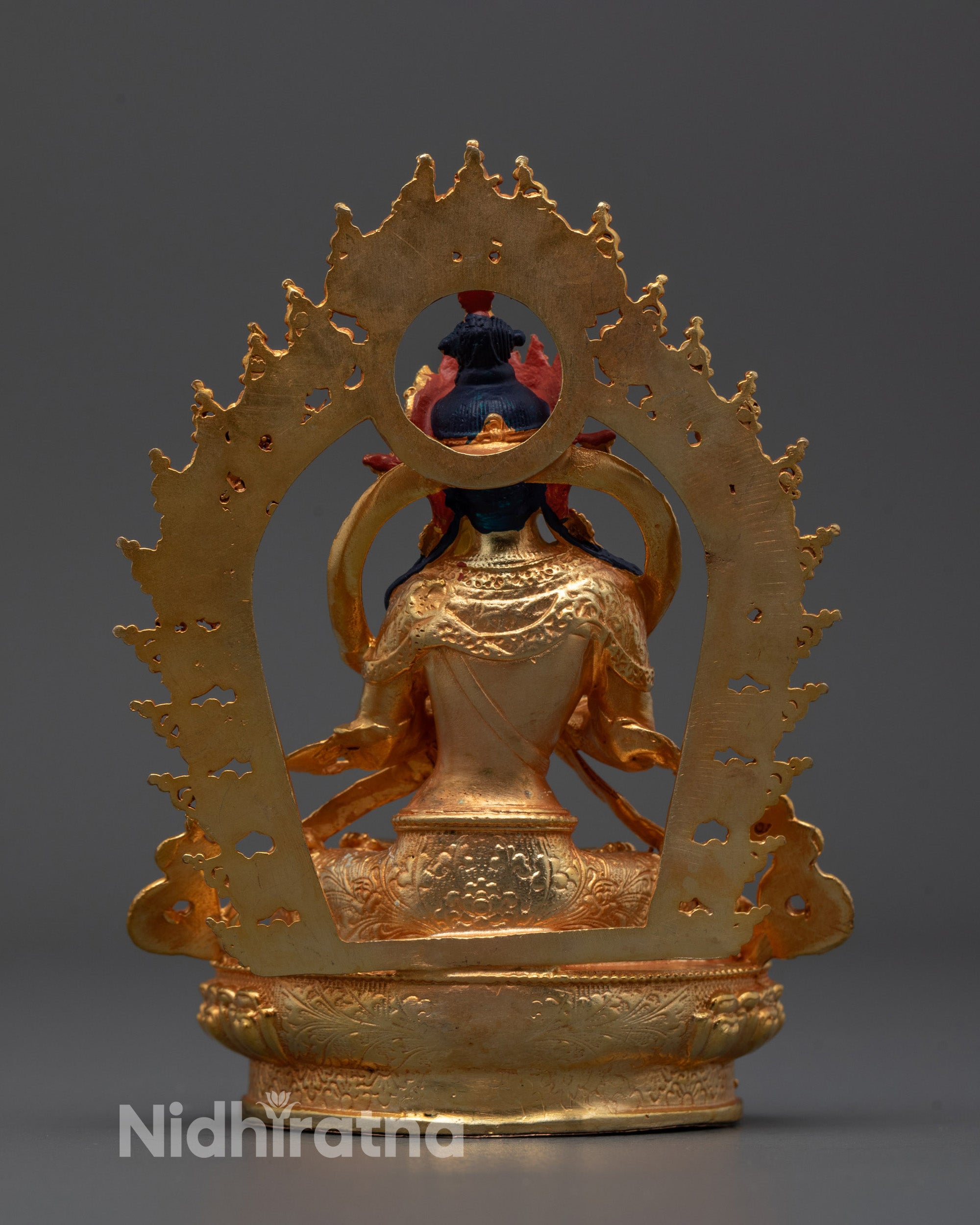 Full image of the Vajradhara Statue seated on a lotus throne
