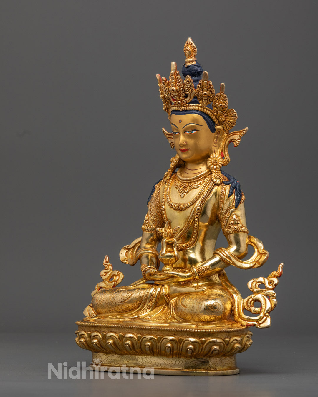 Amitayus Buddha figure seated on lotus throne, handcrafted using the lost wax method by Nepalese artisans.