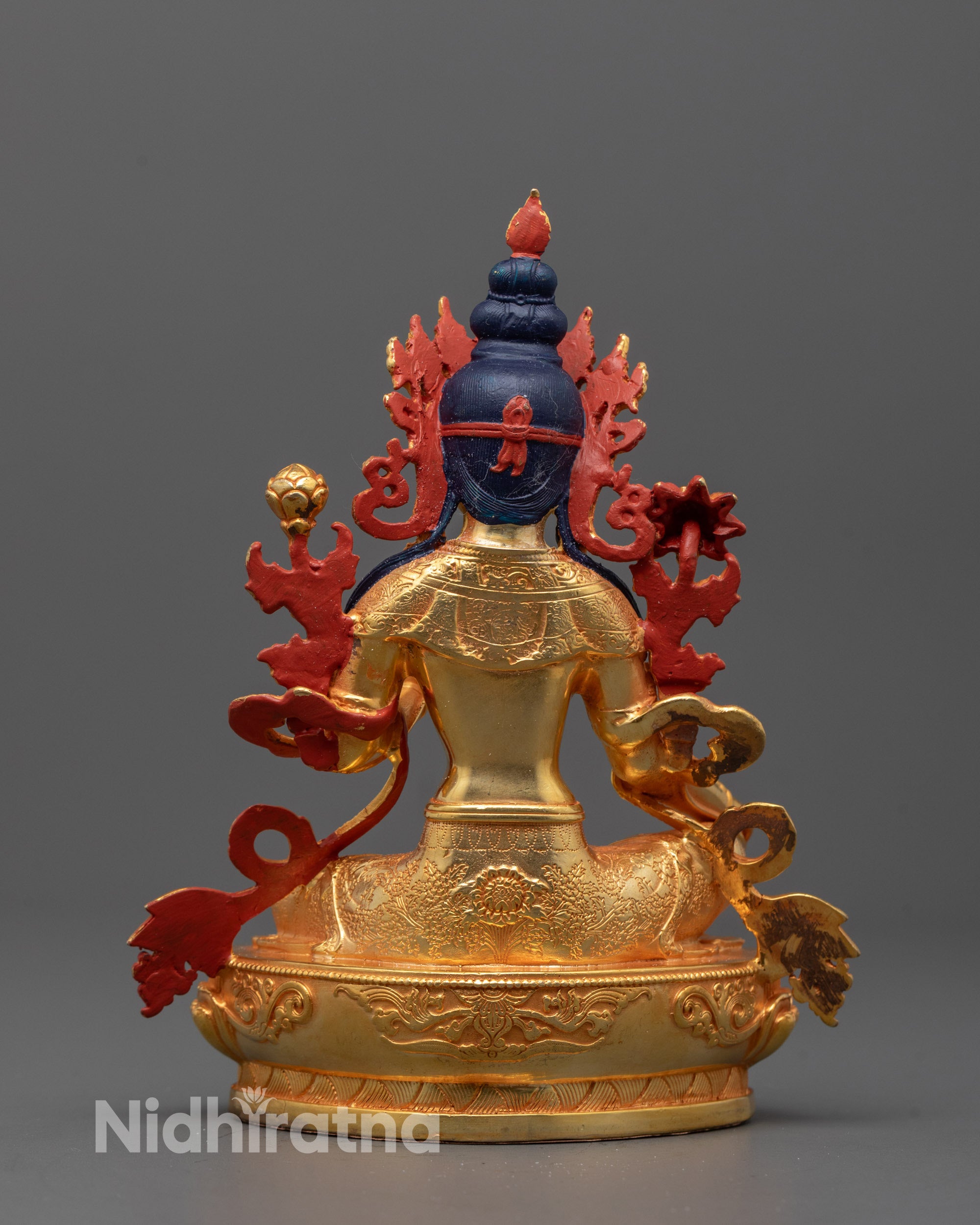 Full view of Green Tara Statue with blooming lotus seat symbolizing purity