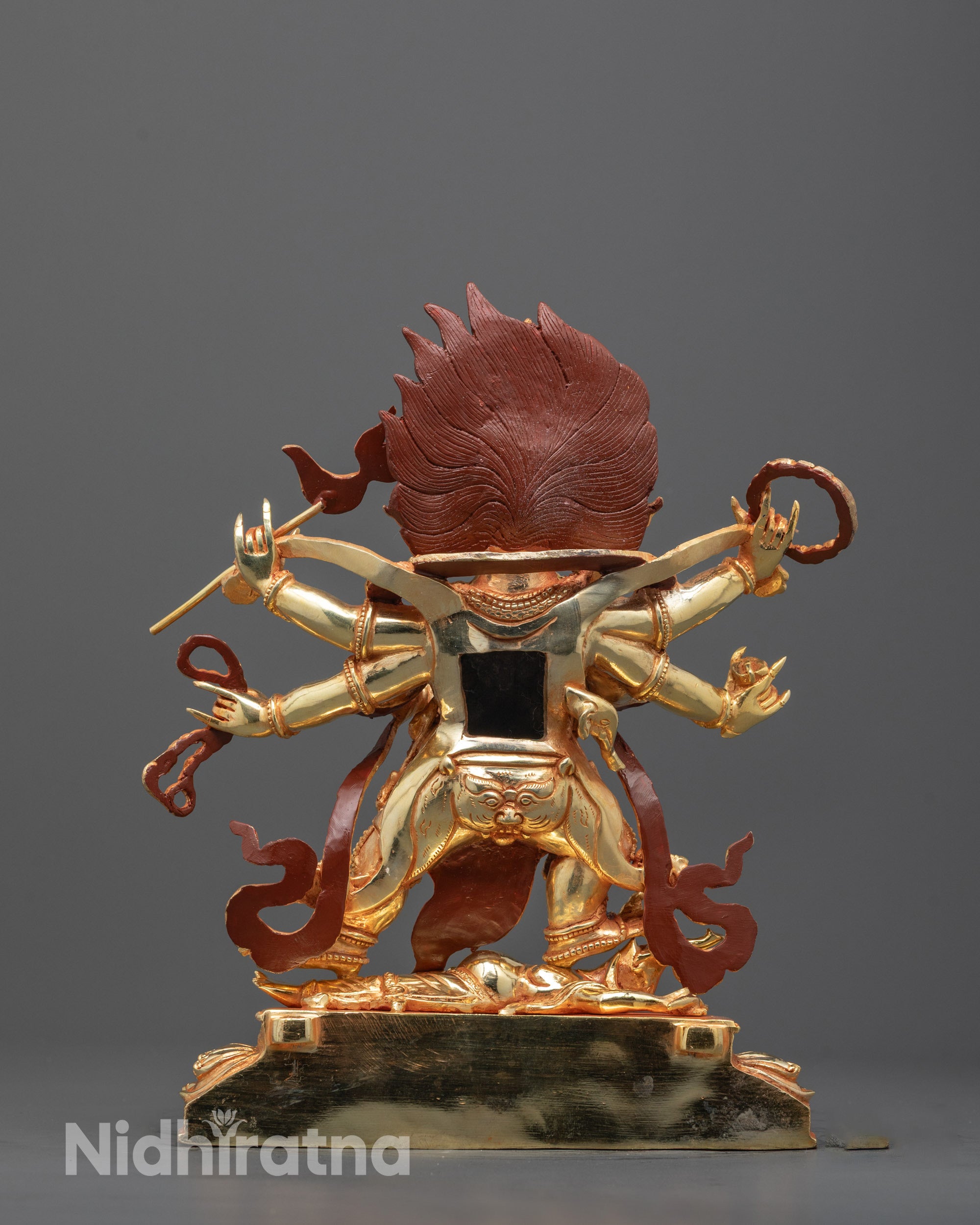 Full view of Six Armed Mahakala Statue in wrathful form with six arms holding symbolic implements