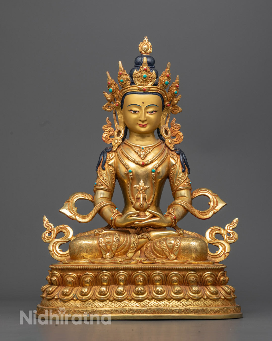 Amitayus Statue seated on a lotus throne, featuring a radiant halo and hollow space for filling auspicious mantras.