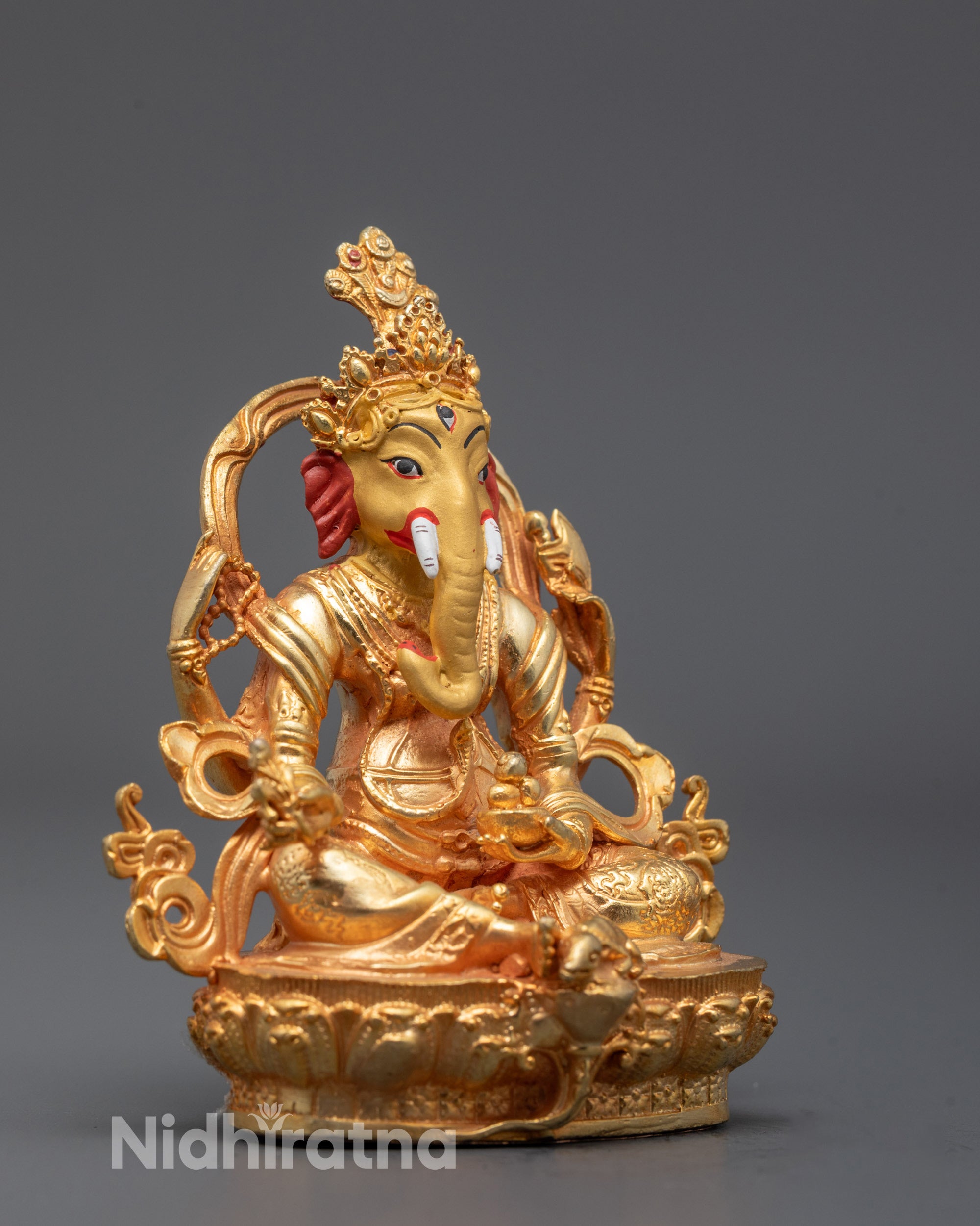 Full View of Machine-Made Ganesh Statue on Lotus Base Symbolizing Remover