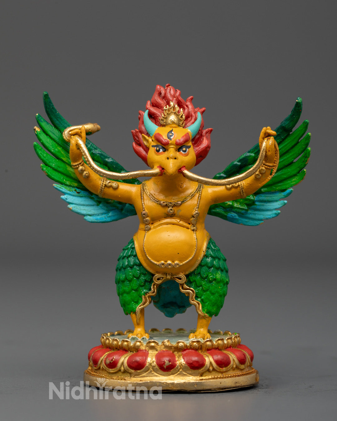Garuda Dev figurine with copper body and gold-plated face showcasing divine strength and protection