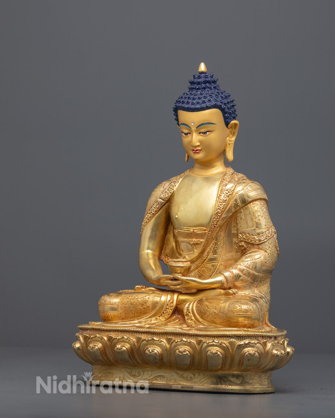 Gold Amitabha Buddha seated on lotus throne with hidden compartment for mantras and meditation focus