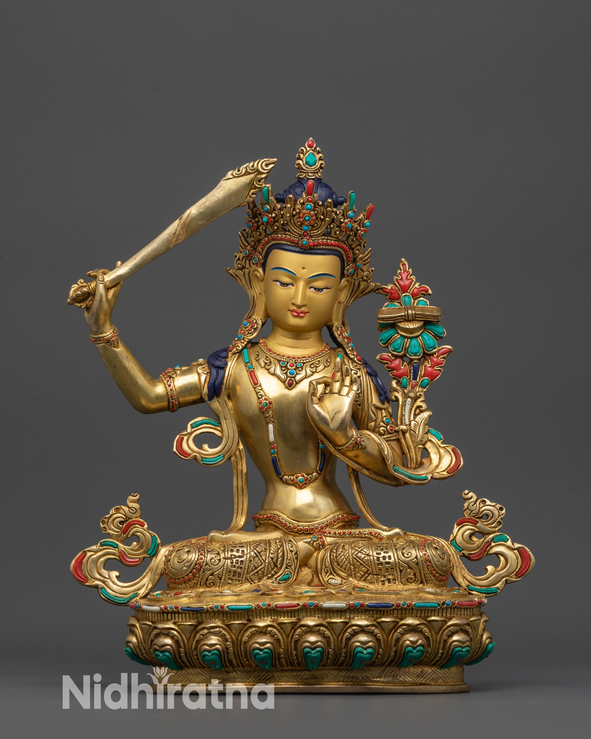 Gold fire-gilded copper base of Manjushri Statue featuring lotus petals, Dharma Wheel, and twin deer carvings.