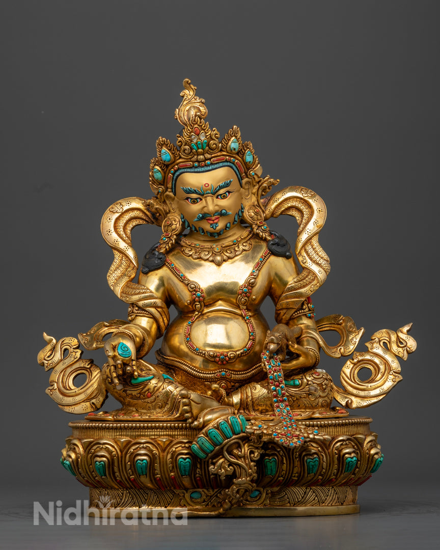 The gold plated Dzamabala statue adorned with semiprecious gemstones | Buddhist Dzambala statue | Dzambala statue for sale