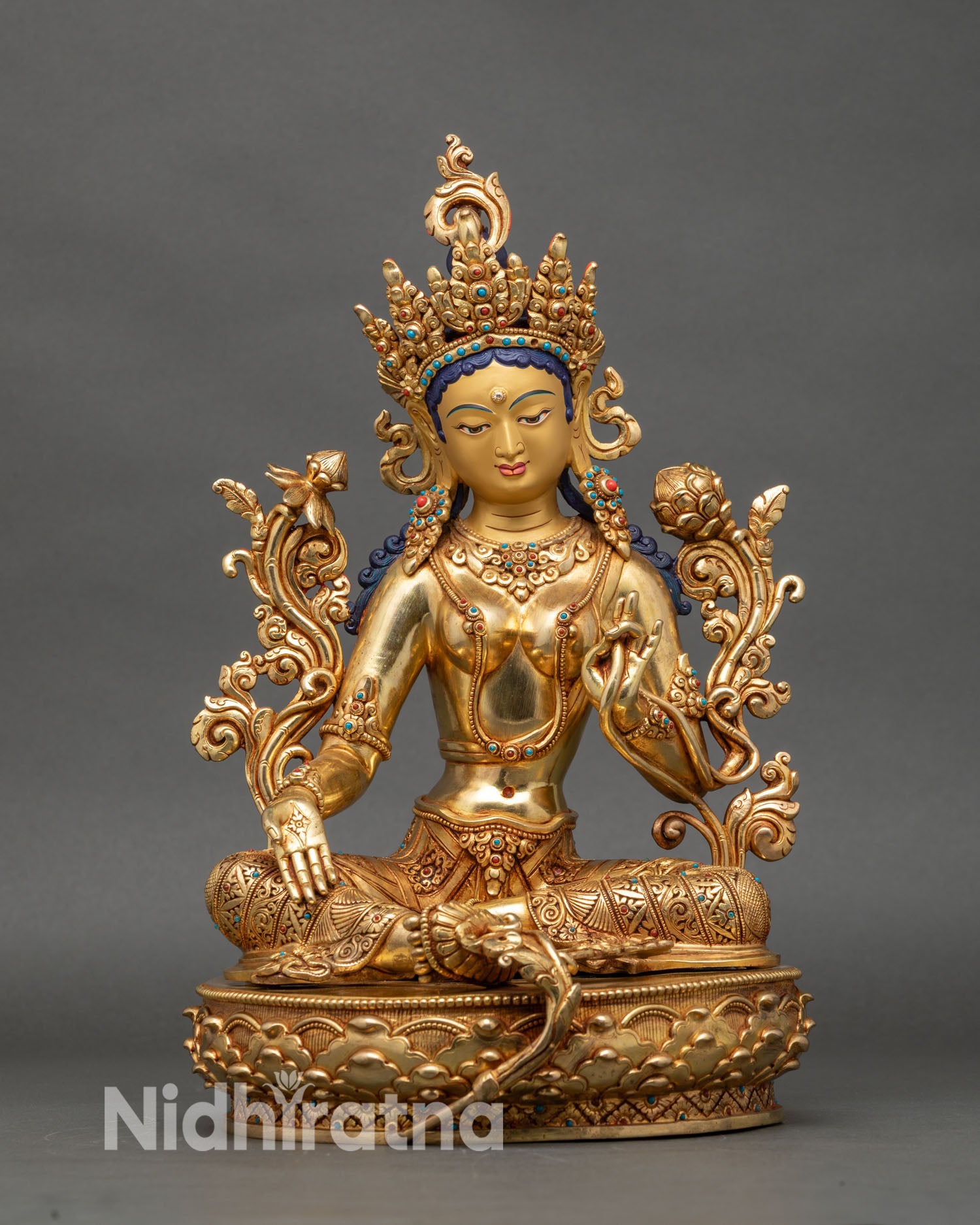 Green Tara statue on lotus pedestal, handcrafted Nepalese copper and gold