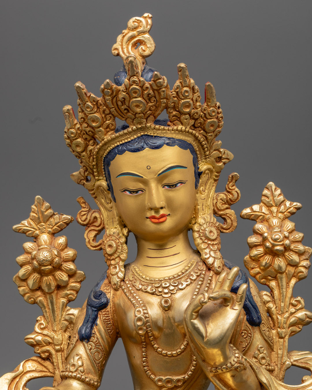 Close-up of Green Tara's Serene Face with Acrylic Detail – Symbol of Swift Protection and Wisdom