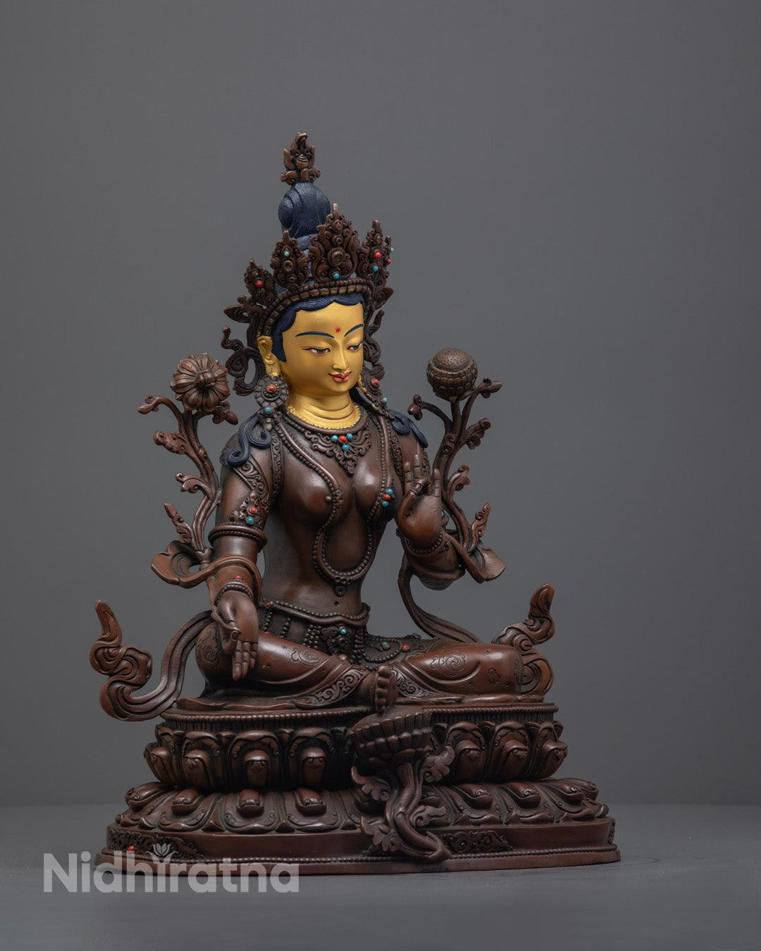 Handcrafted Green Tara Buddha statue, symbol of compassion and swift protection, ideal for altars and spiritual home décor.
