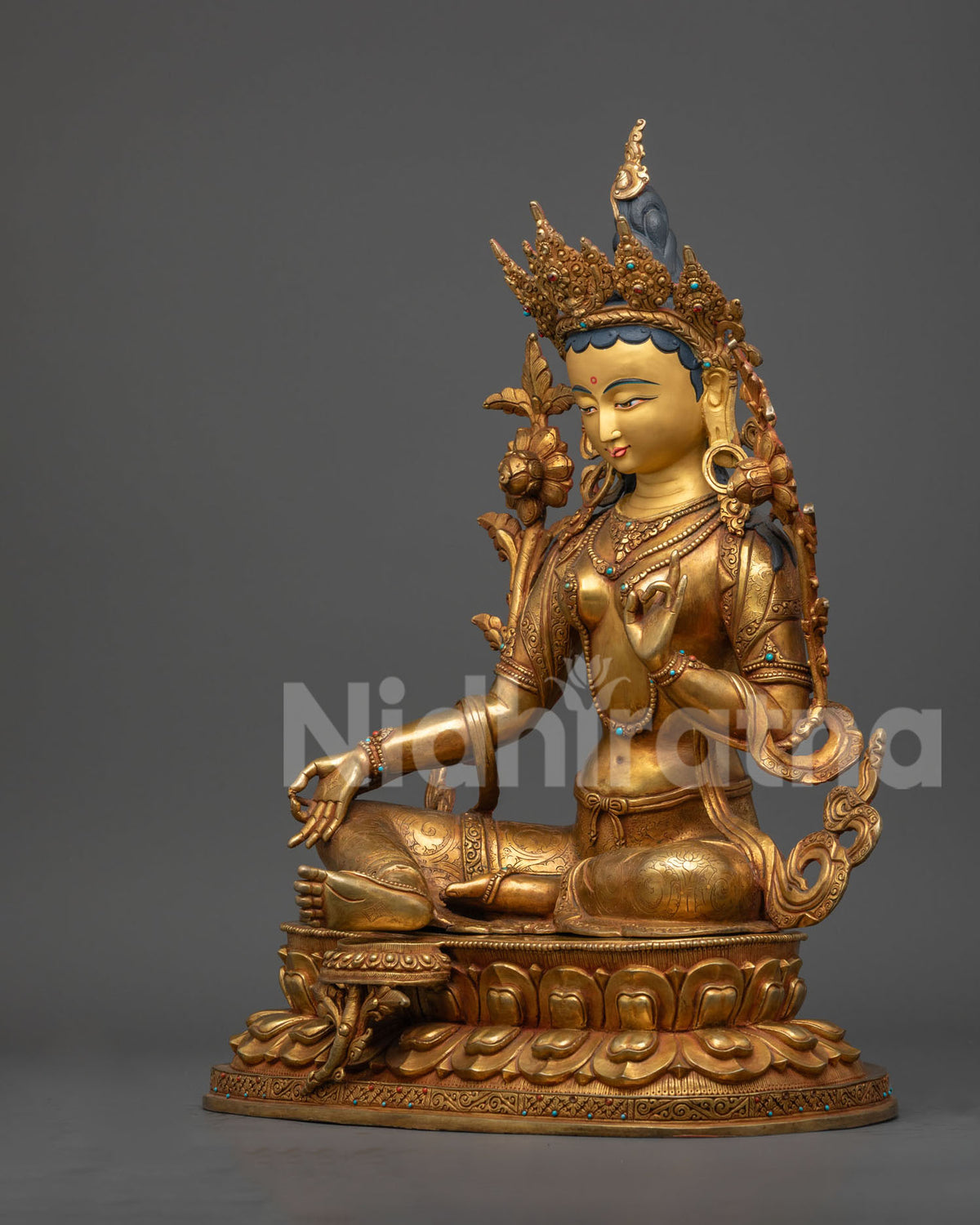green tara statue: The Goddess of Compassion