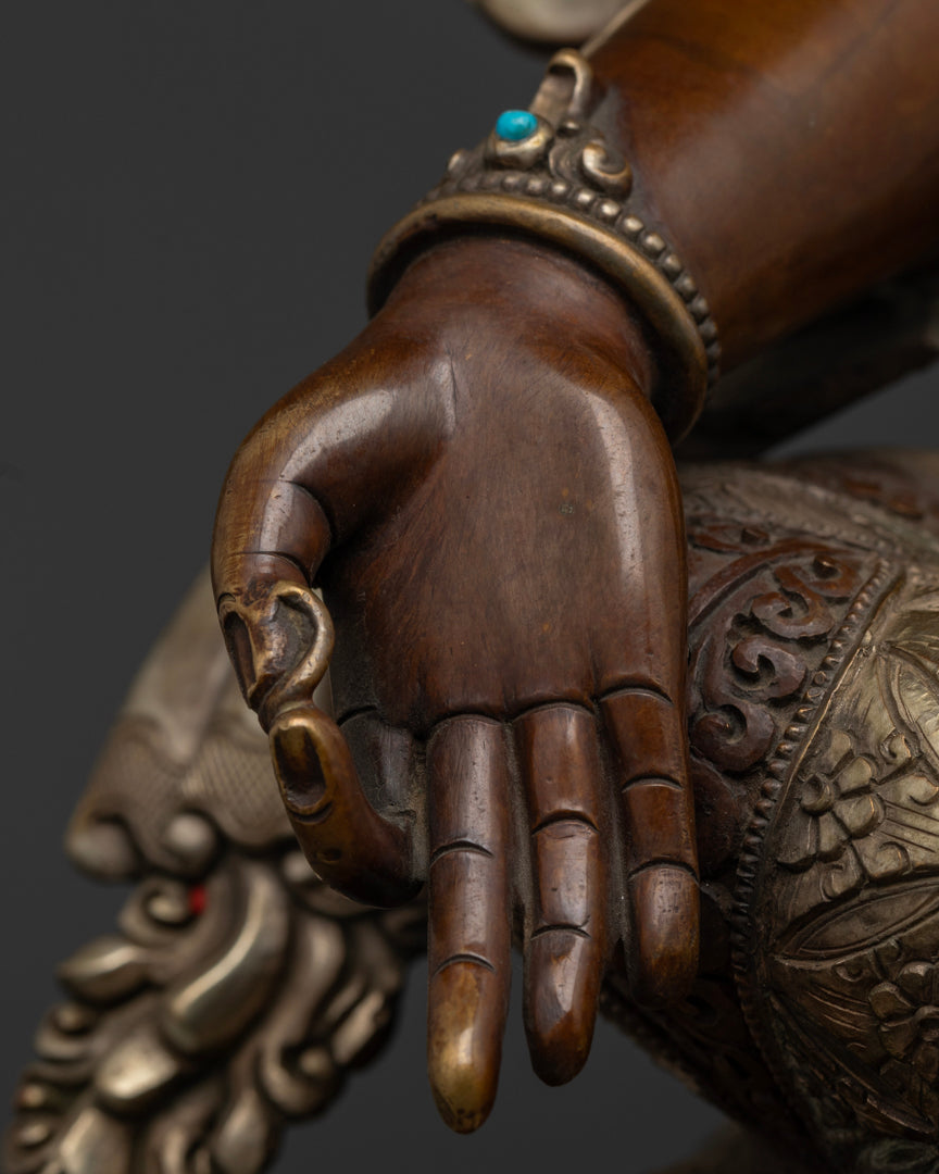 Green tara statue holding the stem of an utpala flower | Green Tara statue for prosperity and protection | Green Tara protector statue