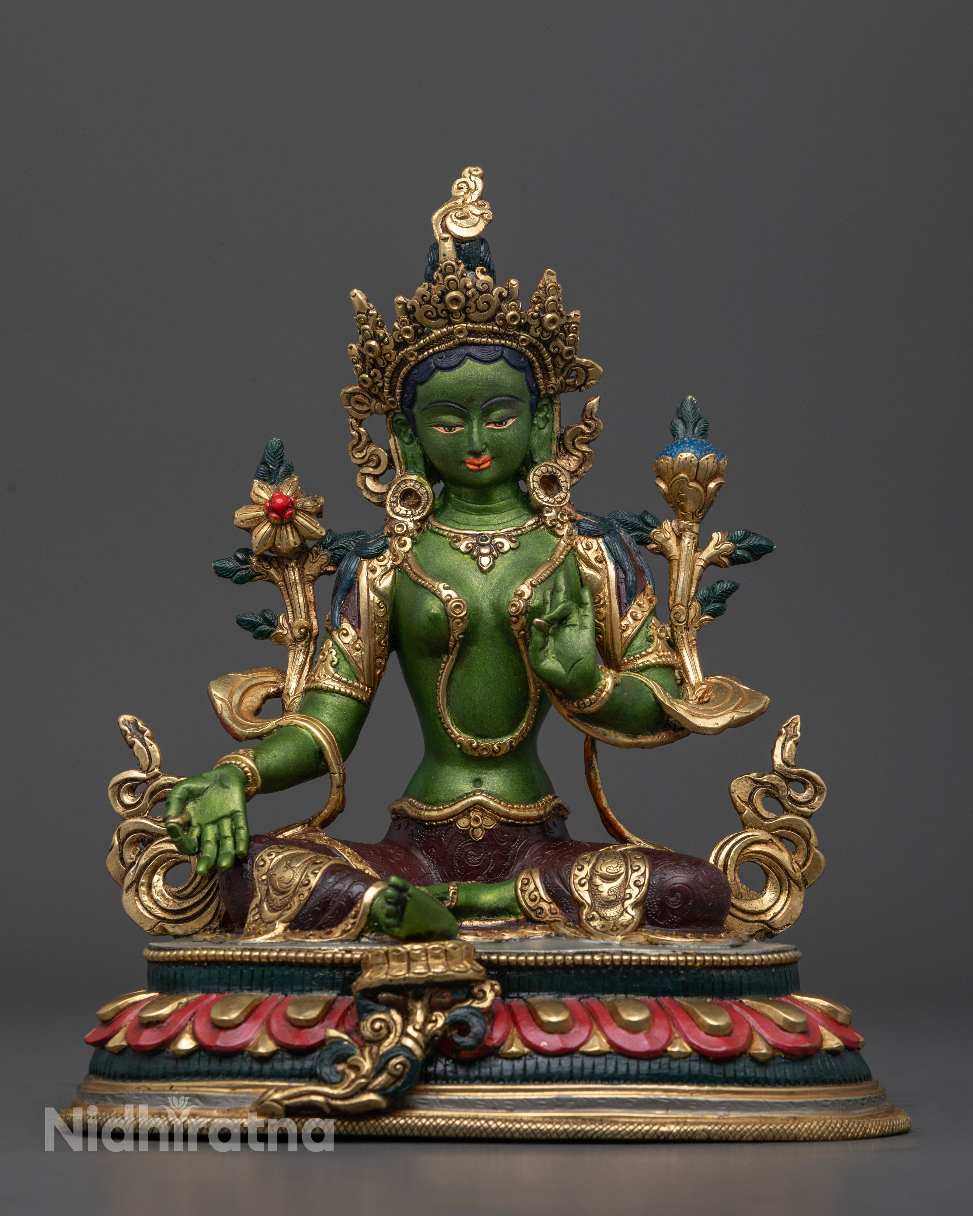 This picture shows full picture of Green Tara Statue in Green Hue with intricate details