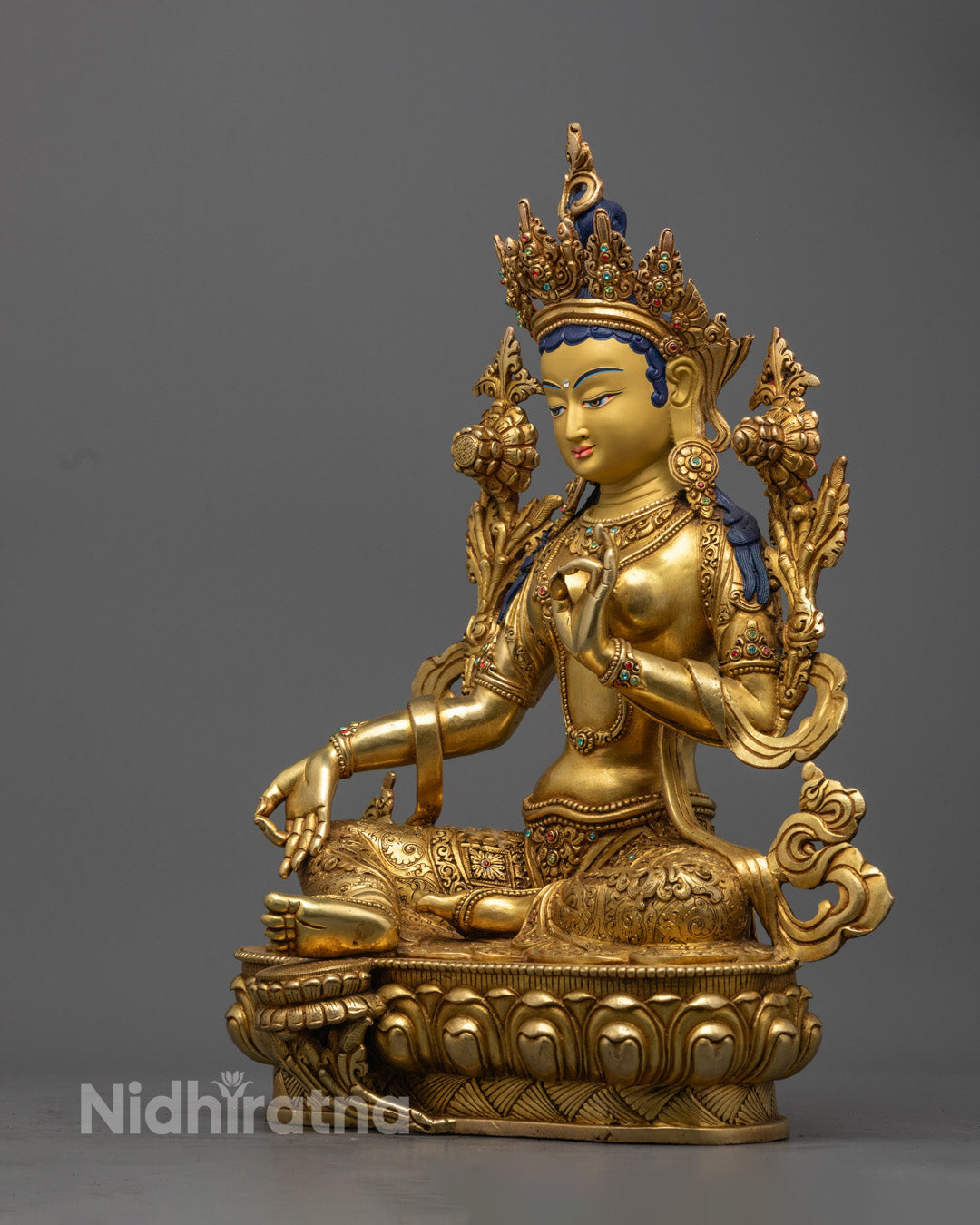 Green Tara Statue showcasing vibrant semi-precious stones and 24K gold gilding, perfect for meditation and spiritual practice.