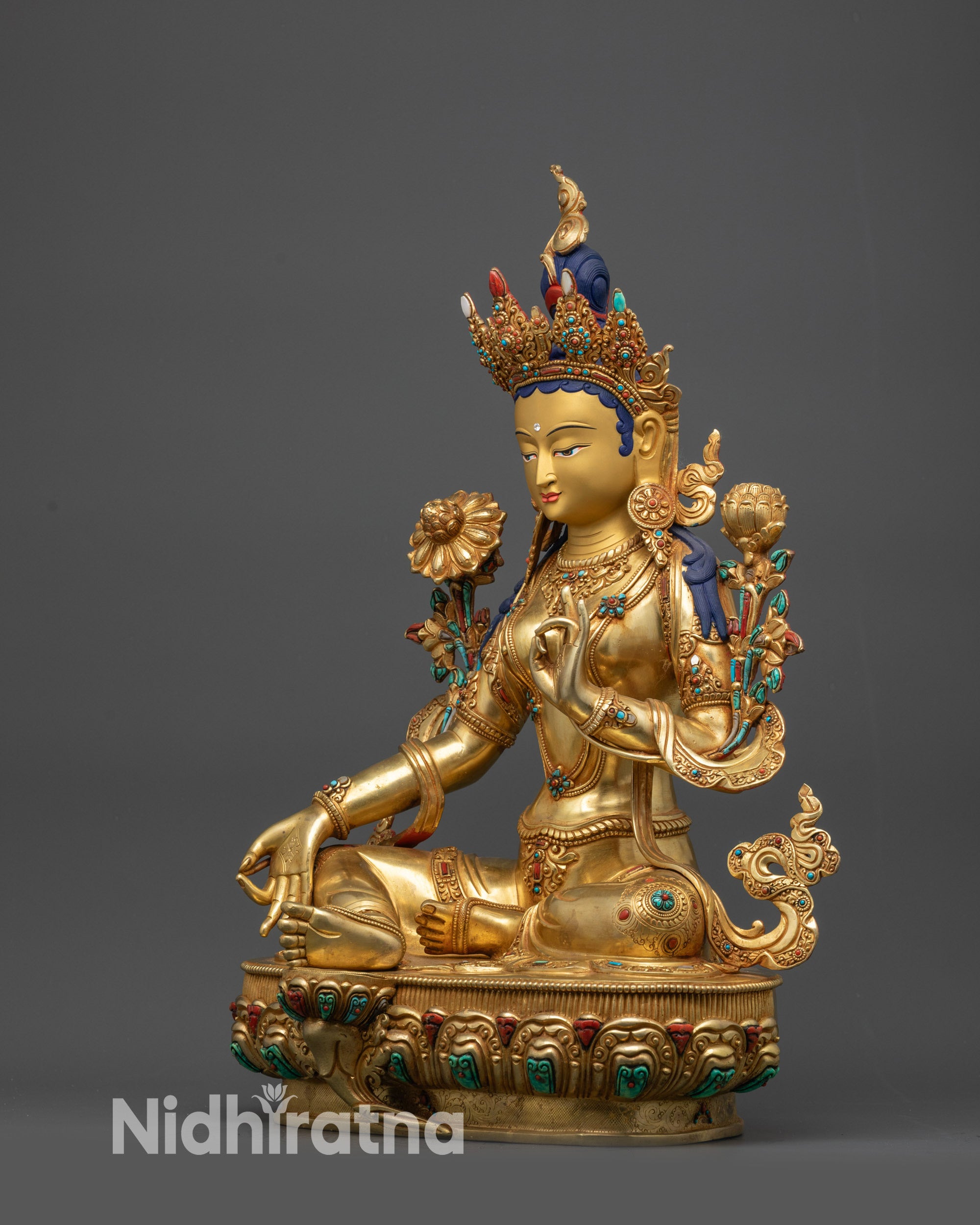 Green Tara left view side showing intricate carvings and semi-precious stone adornments