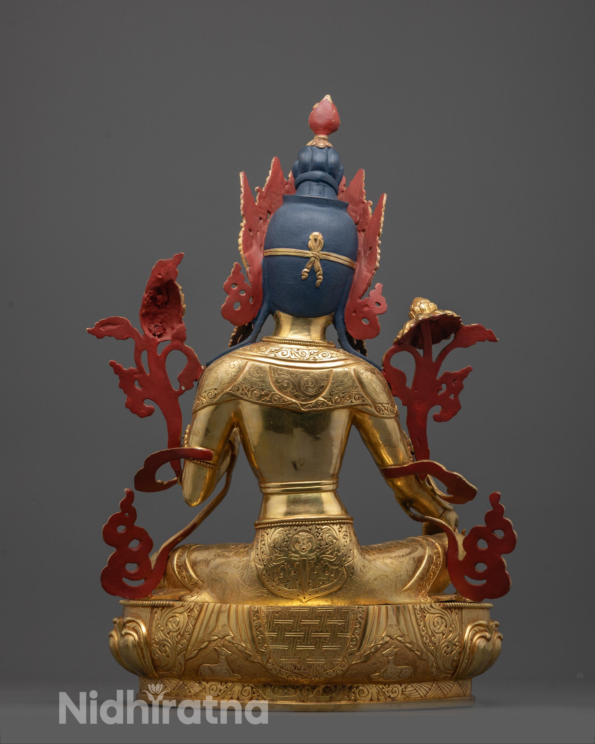 green tara statue back view displaying robe details and artisan work on solid copper craftsmanship
