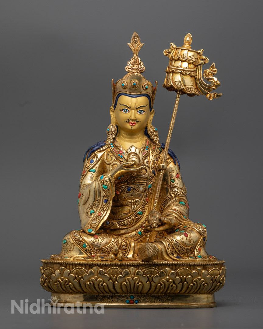 Handcrafted Guru Norla statue in 24K gold gilded copper, seated in traditional wealth-bestowing posture on a lotus base – made in Nepal