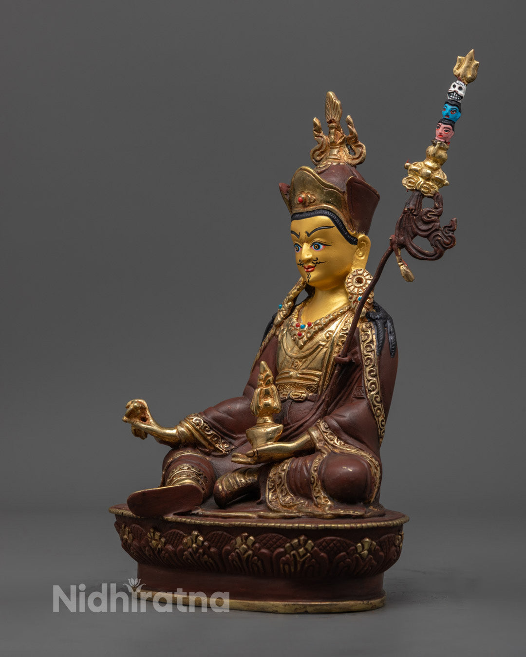 Enlightened Master Guru Rinpoche statue with trident and lotus base – spiritual home decor for meditation and altar spaces