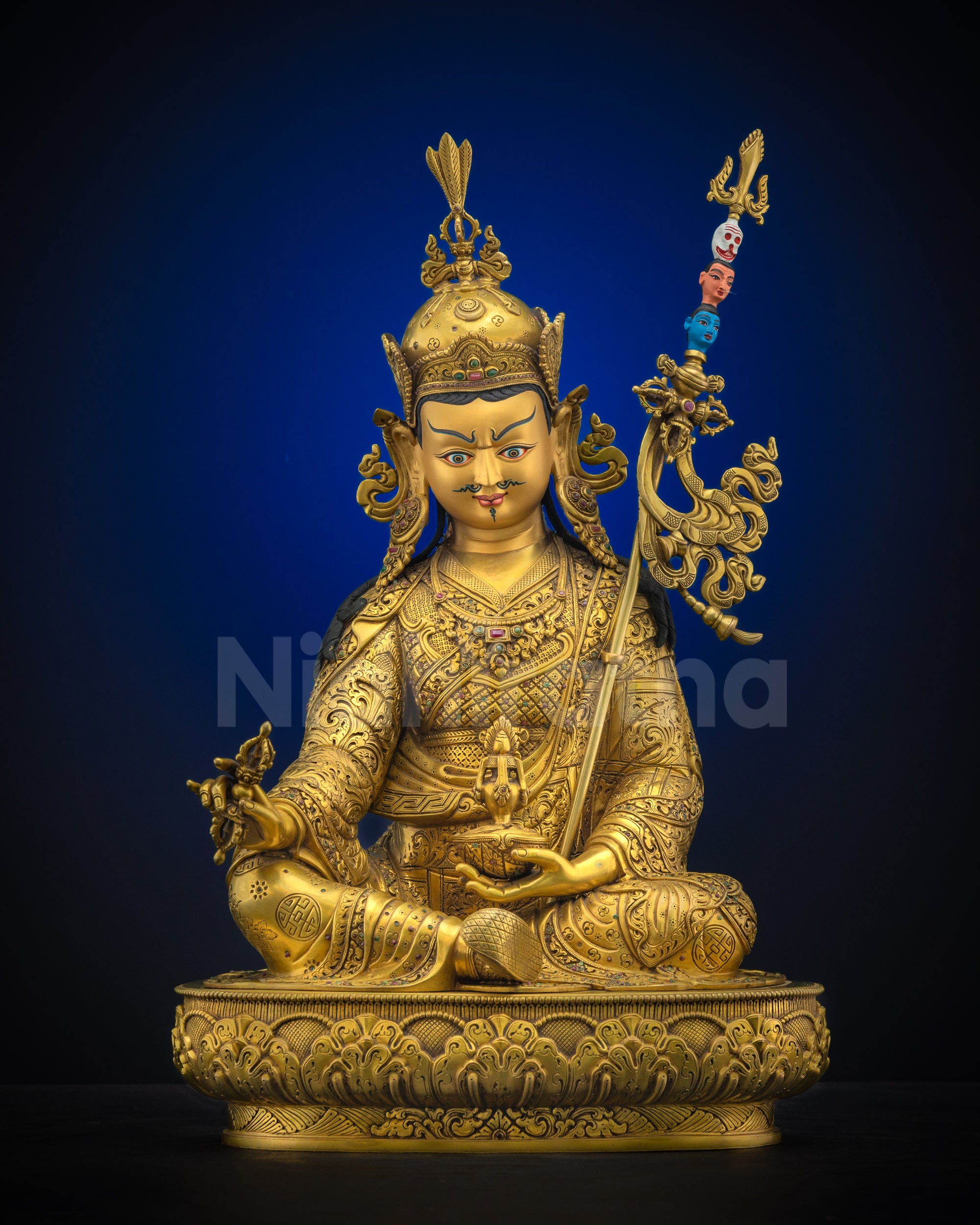 Front view of Guru Rinpoche sculpture, handcrafted in Nepal with gold-gilded face and fire-gilded body