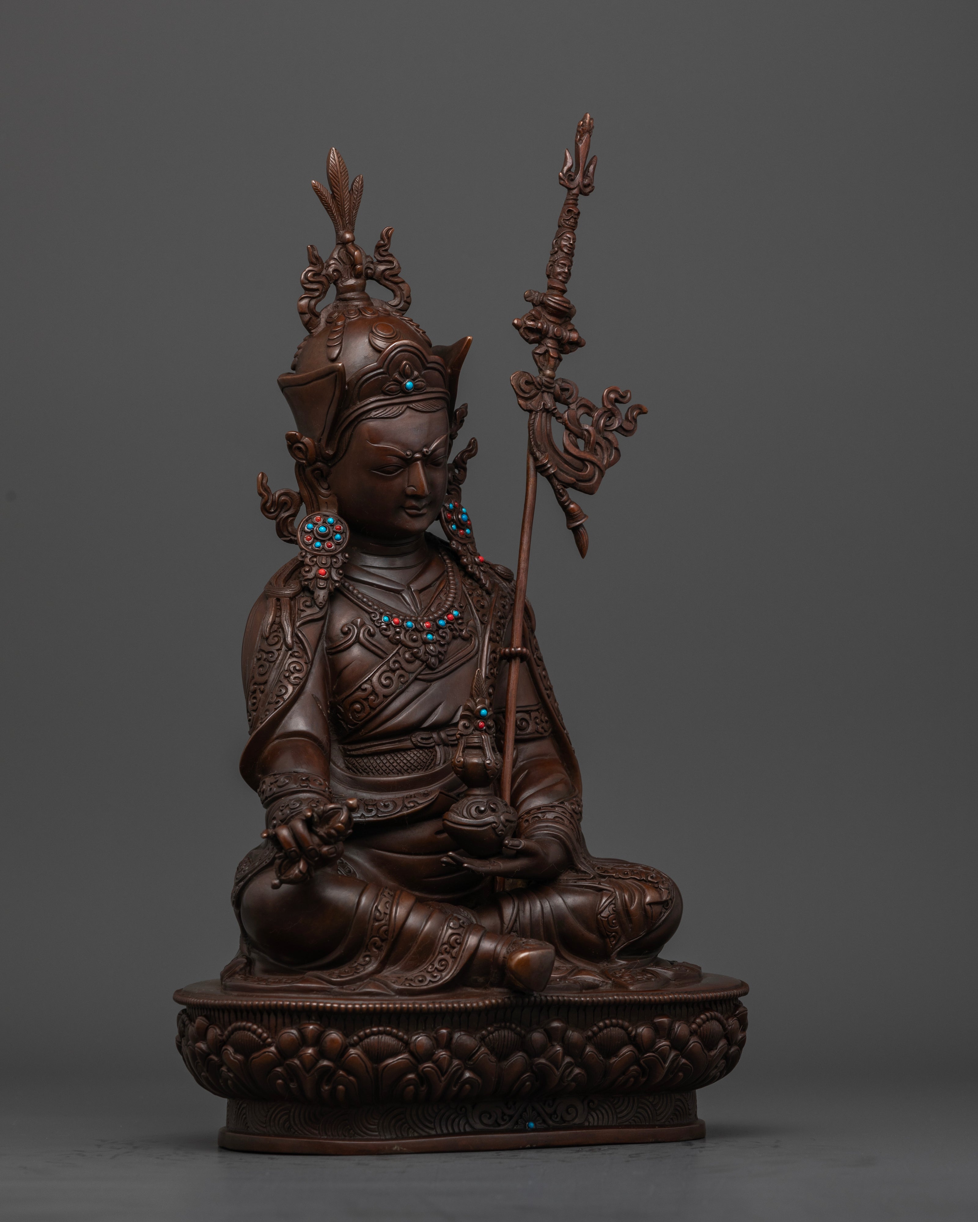 Side profile of Guru Rinpoche oxidized statue