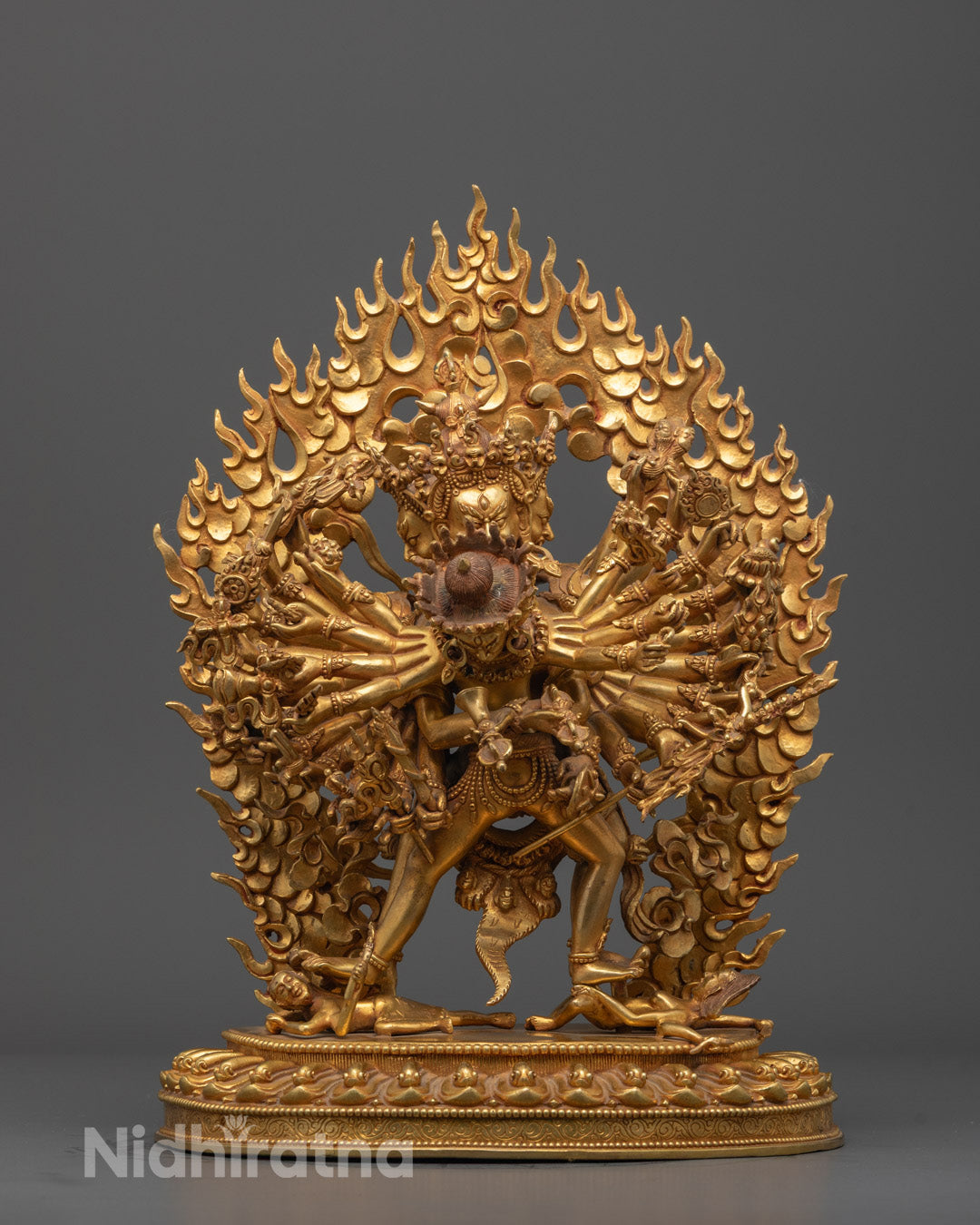 Hand-carved 24k fire-gold gilded Kalachakra statue standing on a lotus seat with two deities