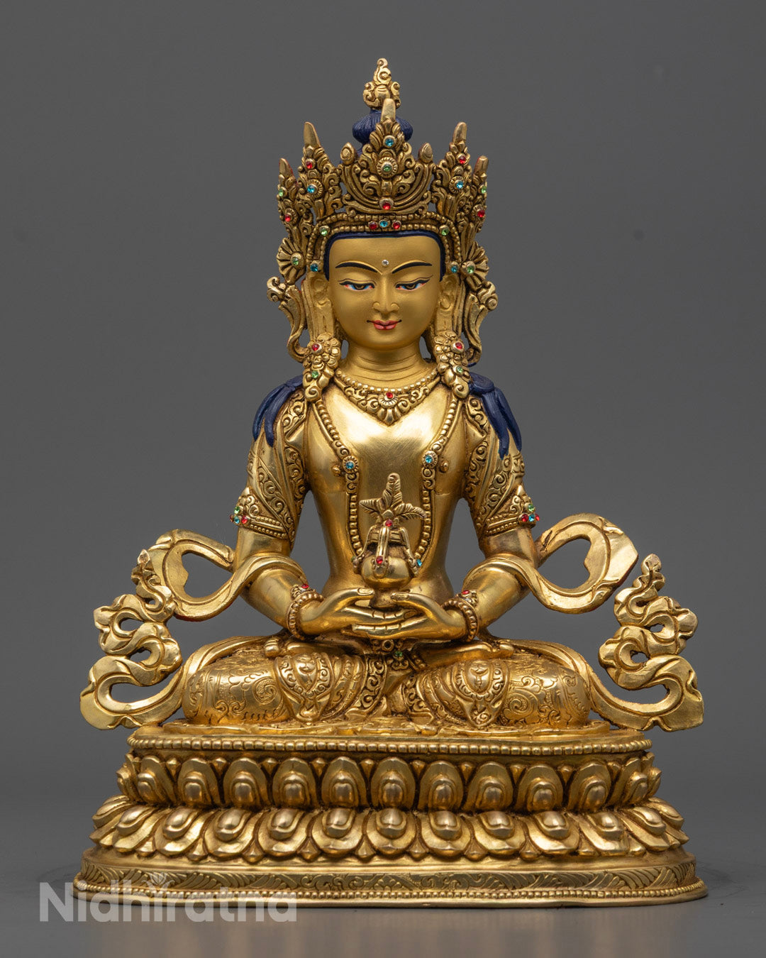 Hand-carved Amitayus Statue with 24k gold fire gilding, seated in serene meditation holding a vase of immortality, symbolizing longevity and spiritual abundance.