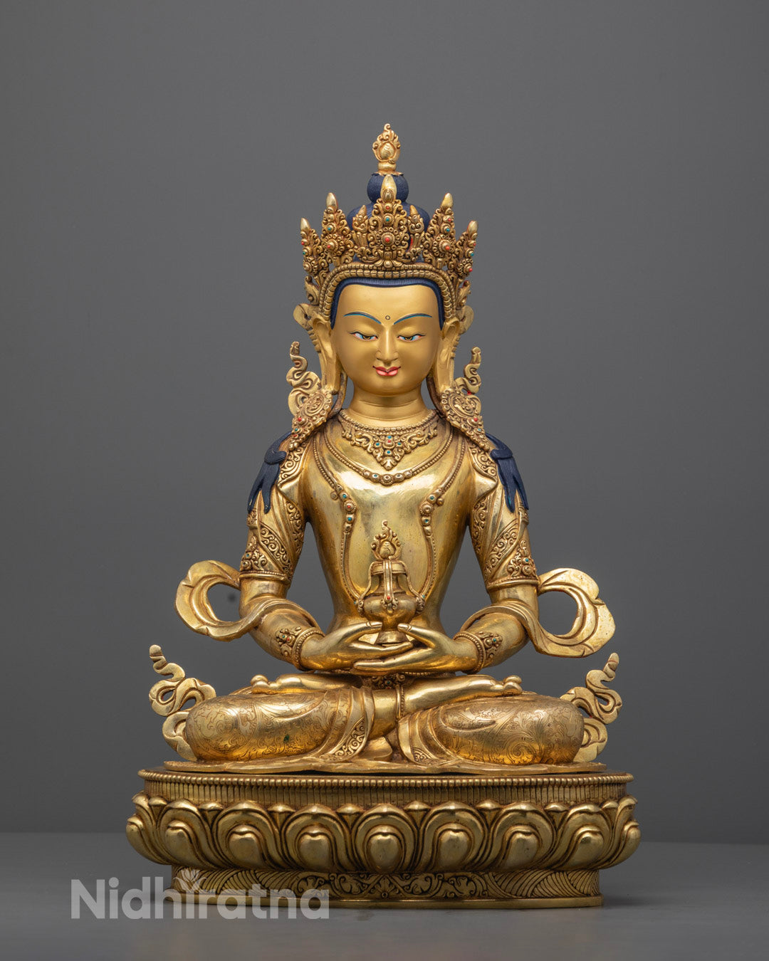 Hand-carved Amitayus statue adorned with 24k fire-gilded gold, seated on a lotus throne with intricate traditional Nepalese craftsmanship.