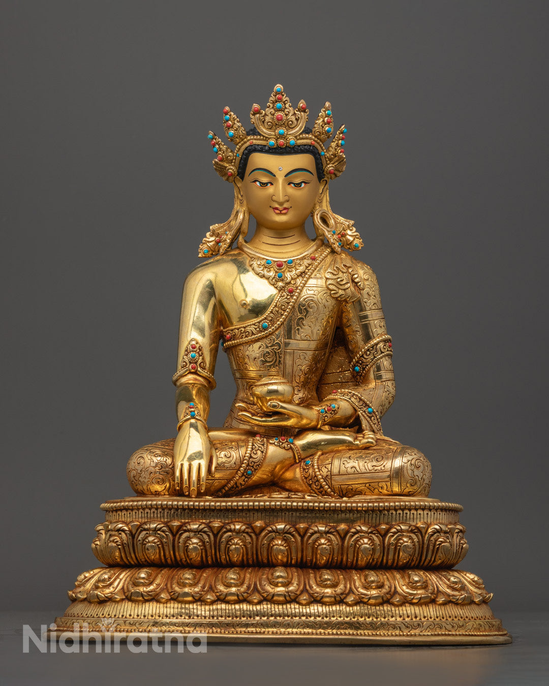 Hand-carved Crowned Shakyamuni Buddha Statue seated on a lotus throne with golden fire-gilded finish and radiant halo, symbolizing enlightenment and peace.