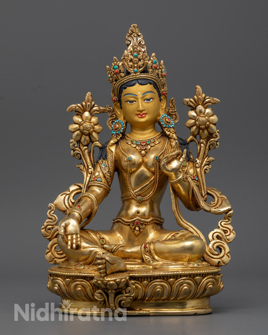 Hand-carved Green Tara Statue seated on a lotus throne, adorned with 24K gold gilding and semi-precious stones