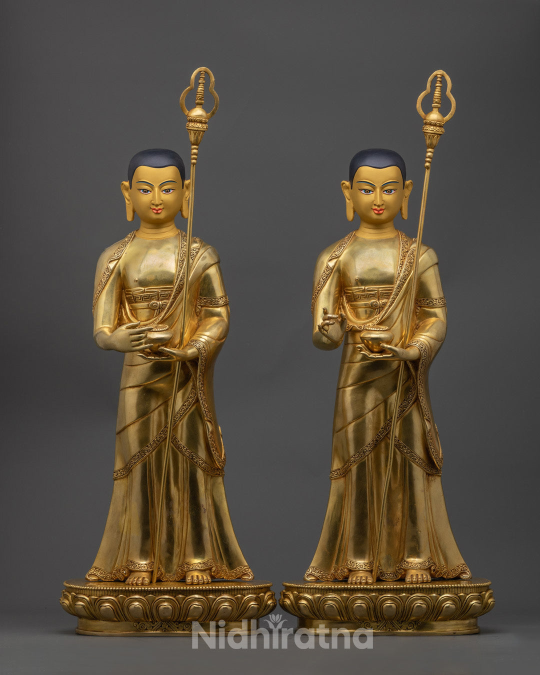 Hand-carved Sariputra statue with intricate 24k gold fire-gilding and vibrant acrylic colors, crafted in Nepal using the lost wax method.