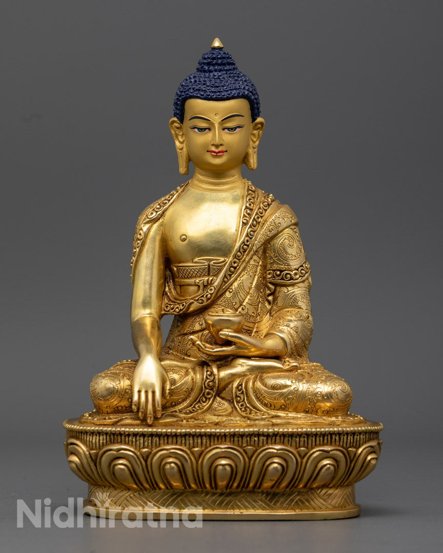 Hand-carved Shakyamuni Buddha Statue made of premium 24k gold gilded copper, showcasing intricate details and craftsmanship.