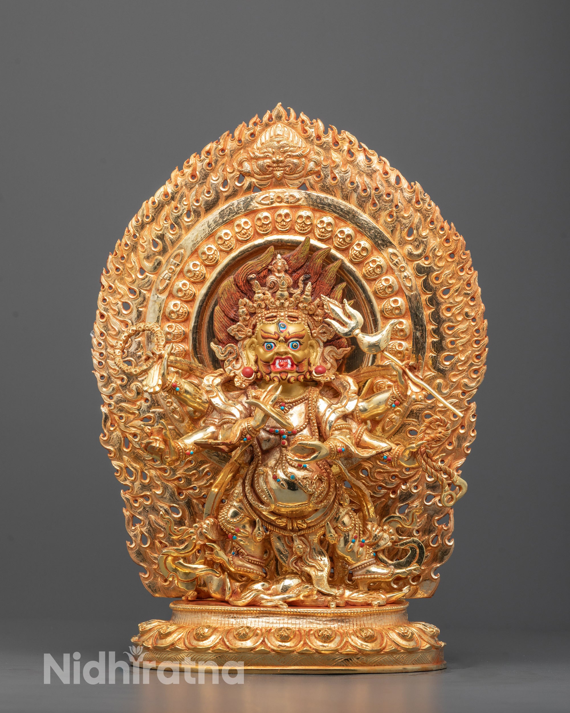 Hand-carved Six Armed Mahakala Statue standing on a lotus base with 24k gold fire gilding