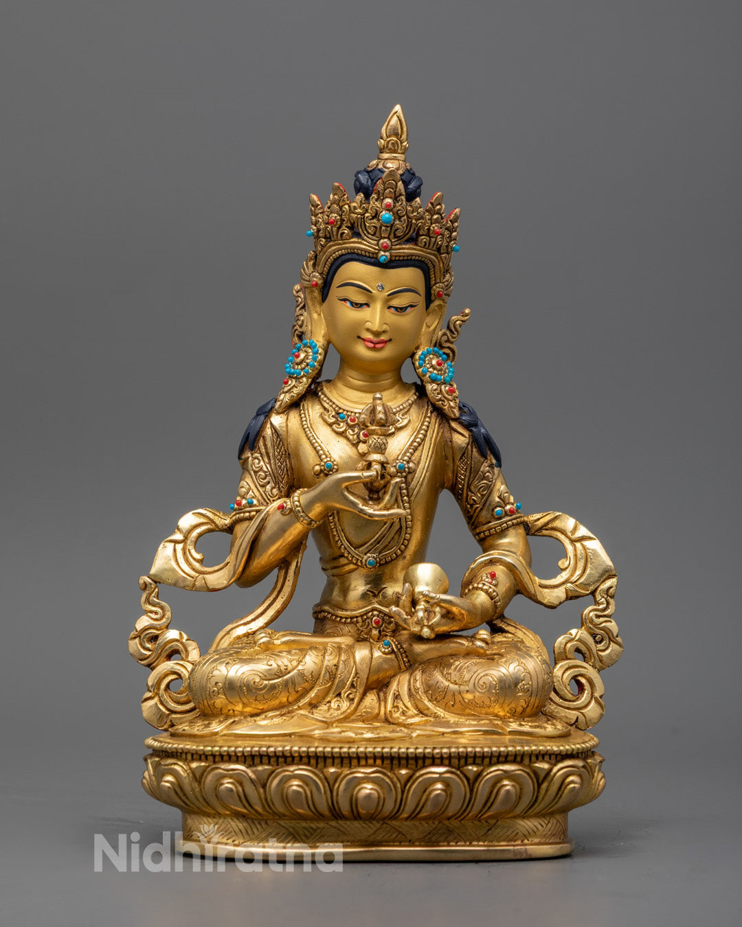 Hand-carved Vajrasattva Statue with gold fire gilding seated on lotus throne, showcasing intricate Tibetan Buddhist craftsmanship.
