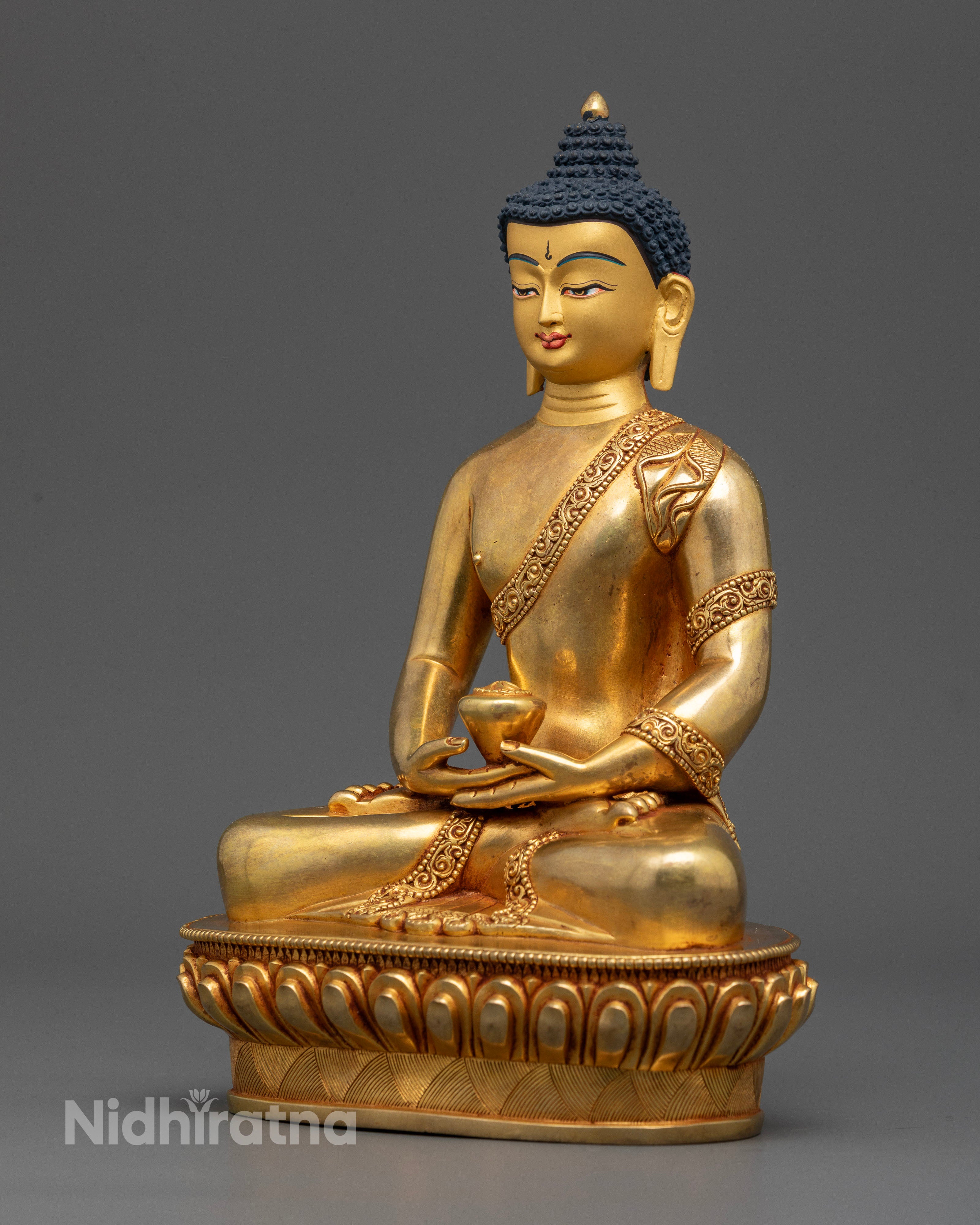 Handcarved monk robe on Amitabha Buddha copper statue from Nepal.