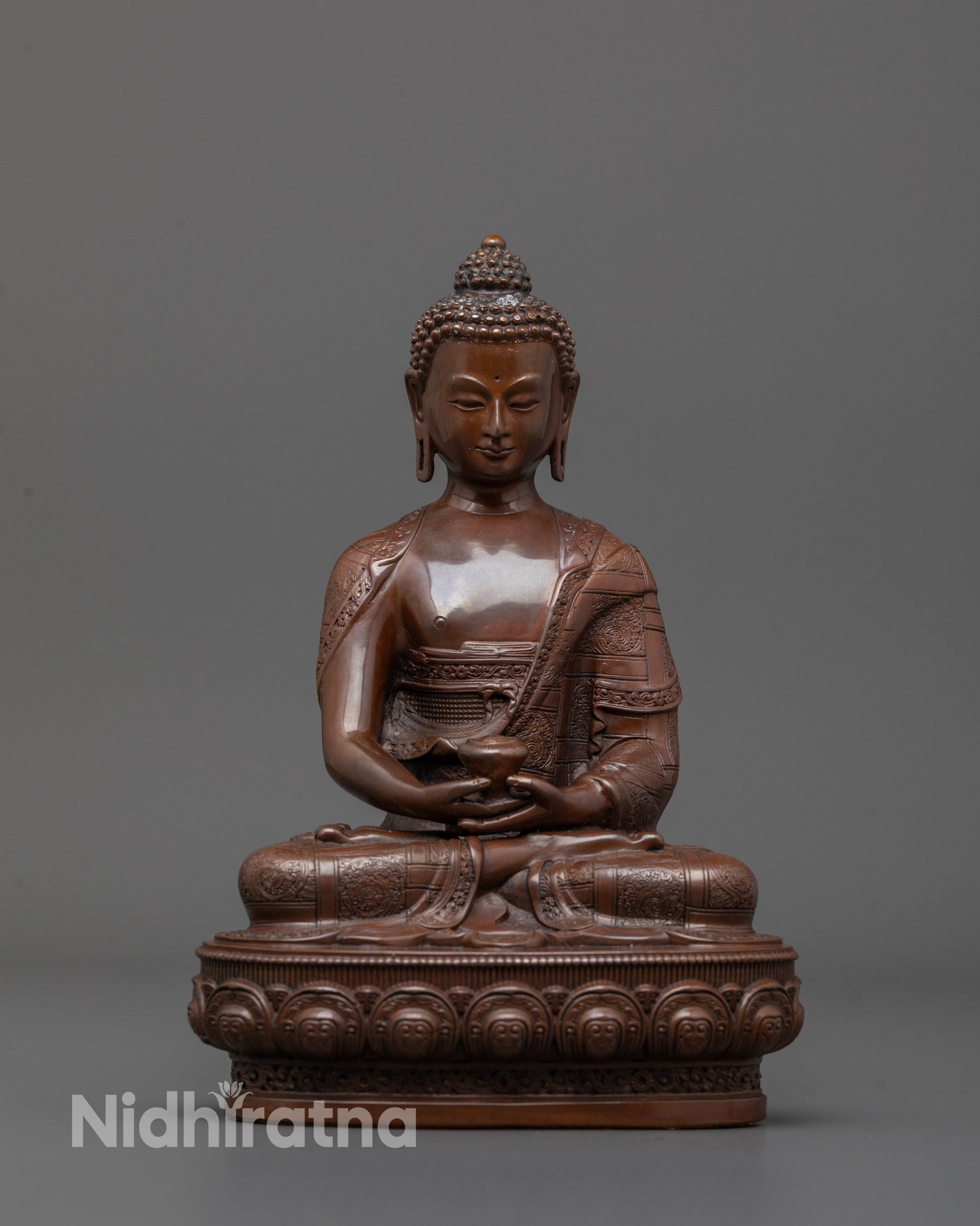 Handcrafted Amitabha Buddha statue seated on lotus base with serene expression