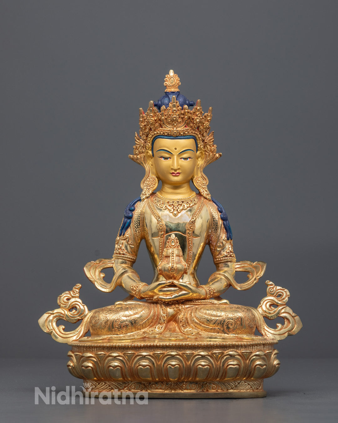 Handcrafted Amitayus Buddha statue with 24K gold fire-gilded body and gold-gilded face symbolizing eternal life and spiritual longevity