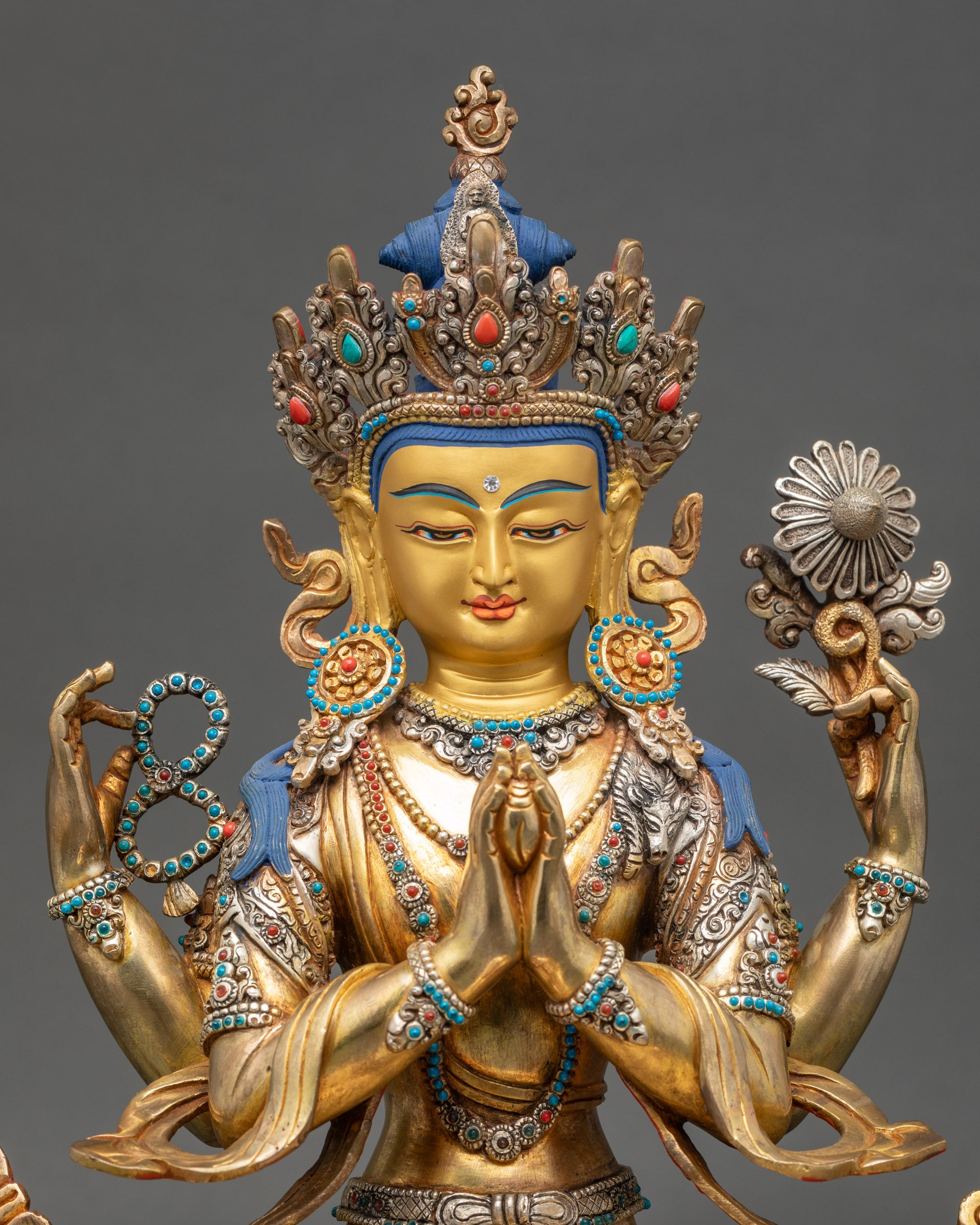 Handcrafted Avalokiteshvara sculpture showing intricate 3D carvings and robe details