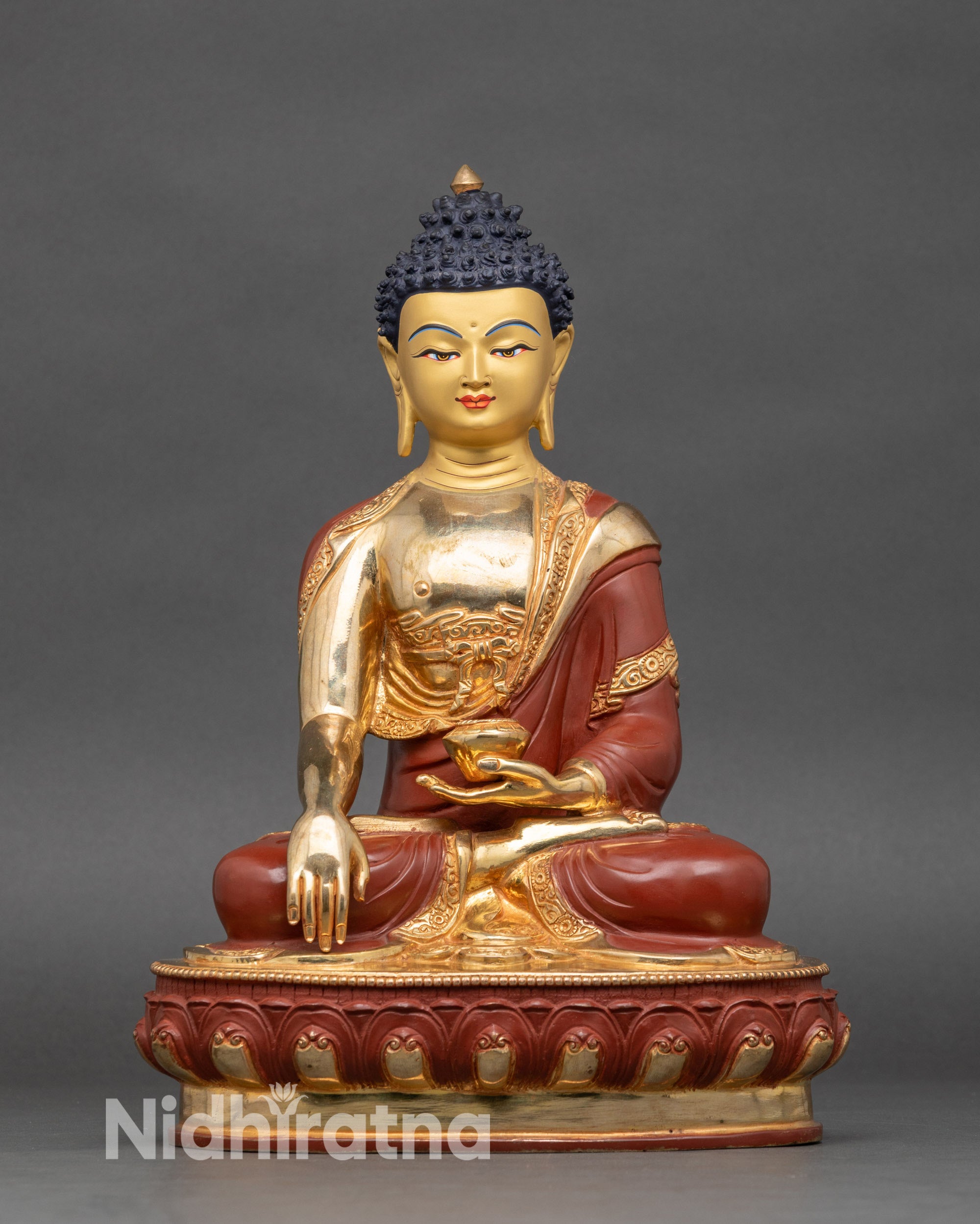 Handcrafted Buddha Shakyamuni Statue from Nepal, gold-gilded, holding monk’s bowl