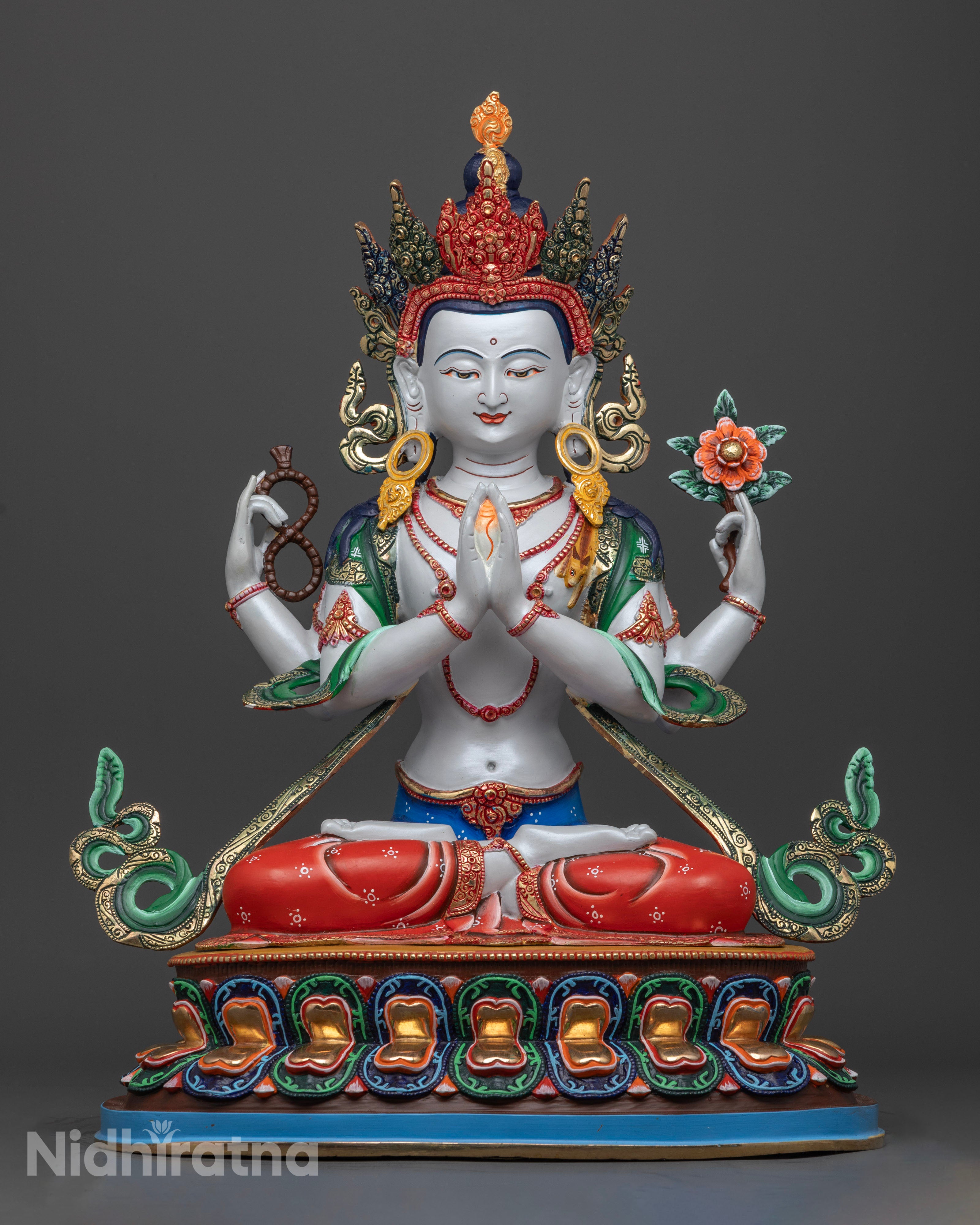 Handcrafted Chenrezig statue from Patan, Nepal, made of high-quality copper with vibrant acrylic colors, standing 47cm tall and 37.5cm wide, showcasing exquisite traditional artistry.