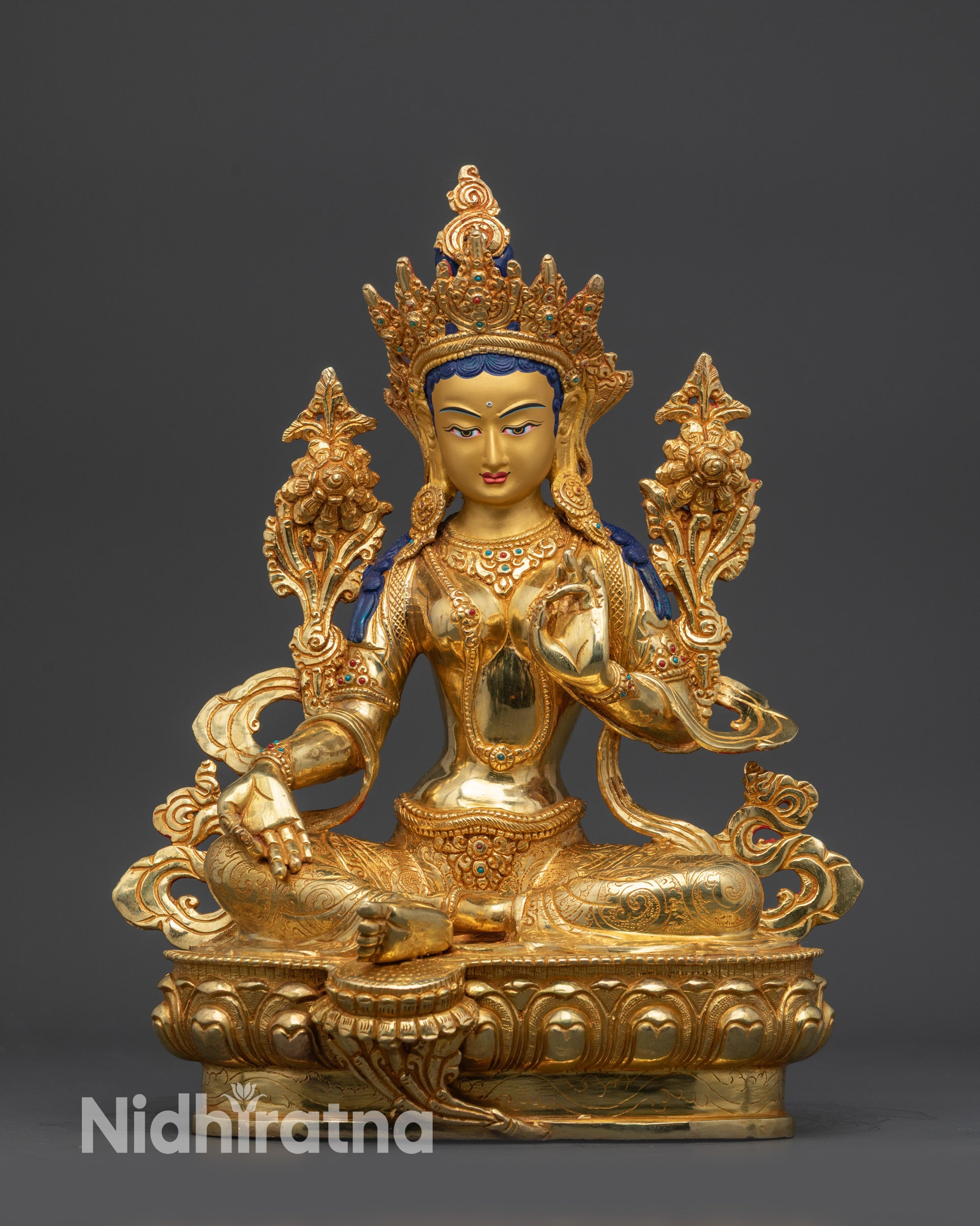 Handcrafted Green Tara Statue with gold-gilded face and lotus seat front view