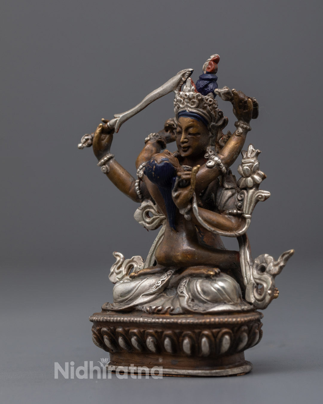 Handcrafted Manjushri Consort seated on silver-plated lotus throne with mantra chamber
