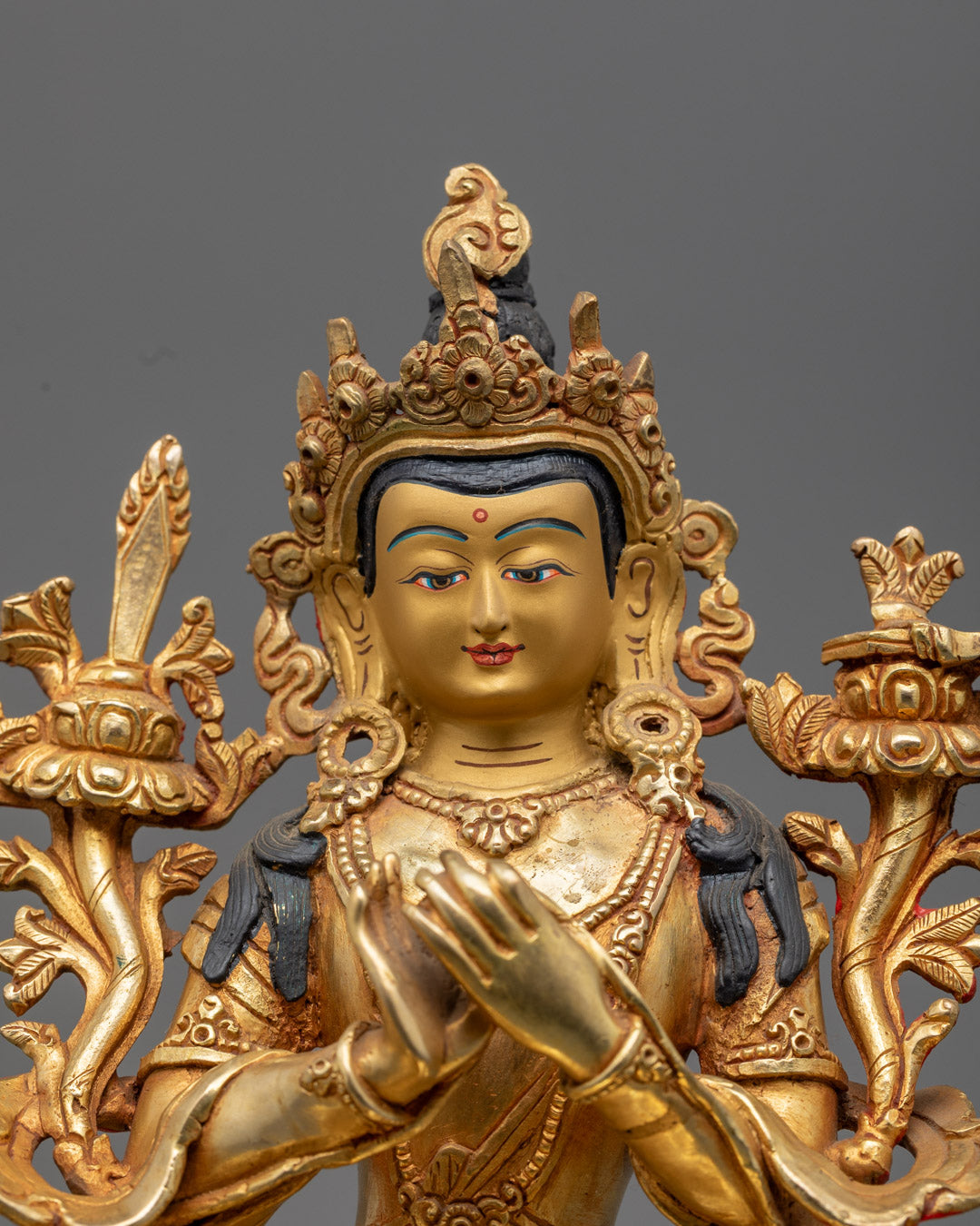 Handcrafted Manjushri statue showing detailed carving on floating robe (Uttariya) and intricate jewelry