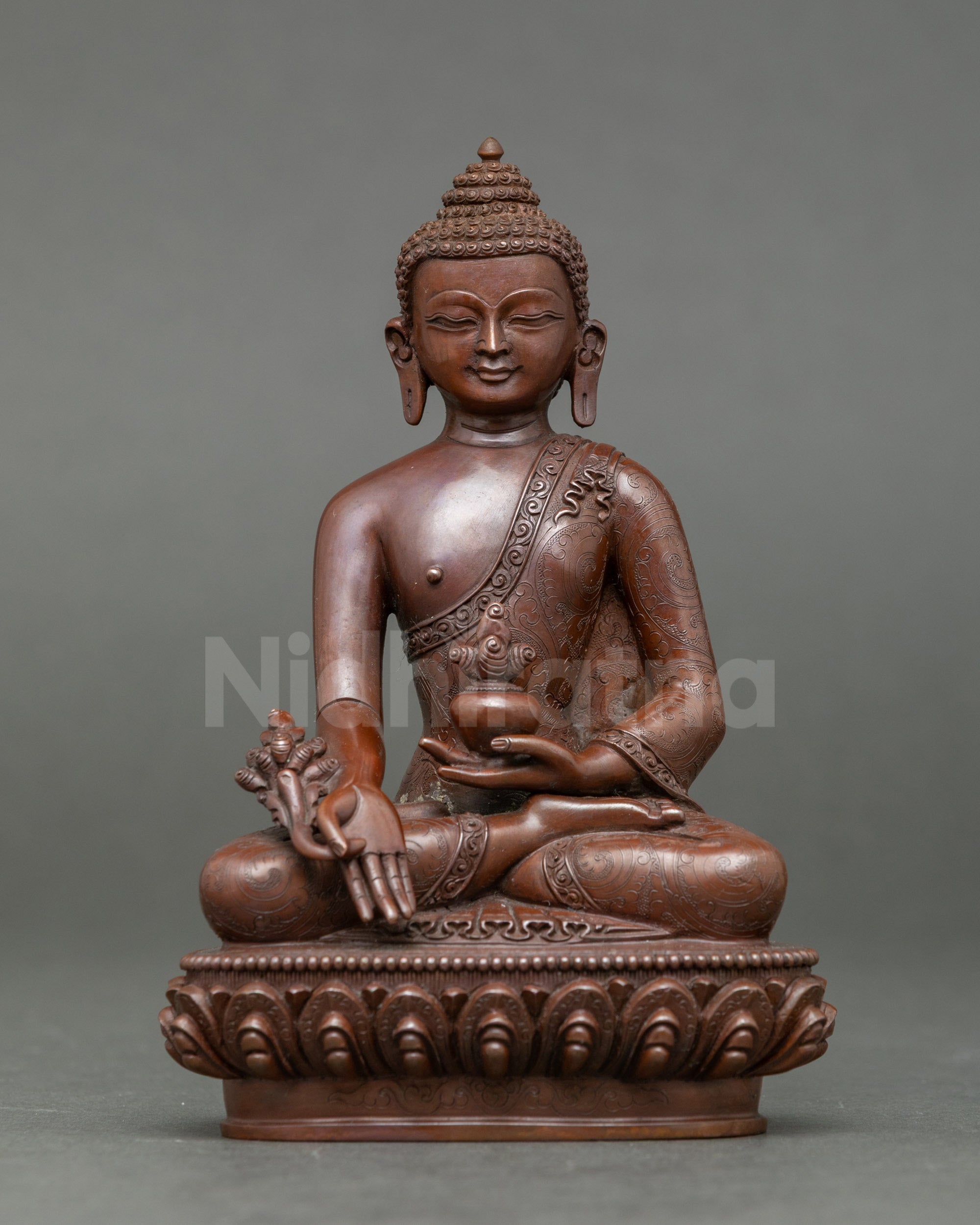 Handcrafted Medicine Buddha statue from Patan Nepal holding healing nectar and myrobalan