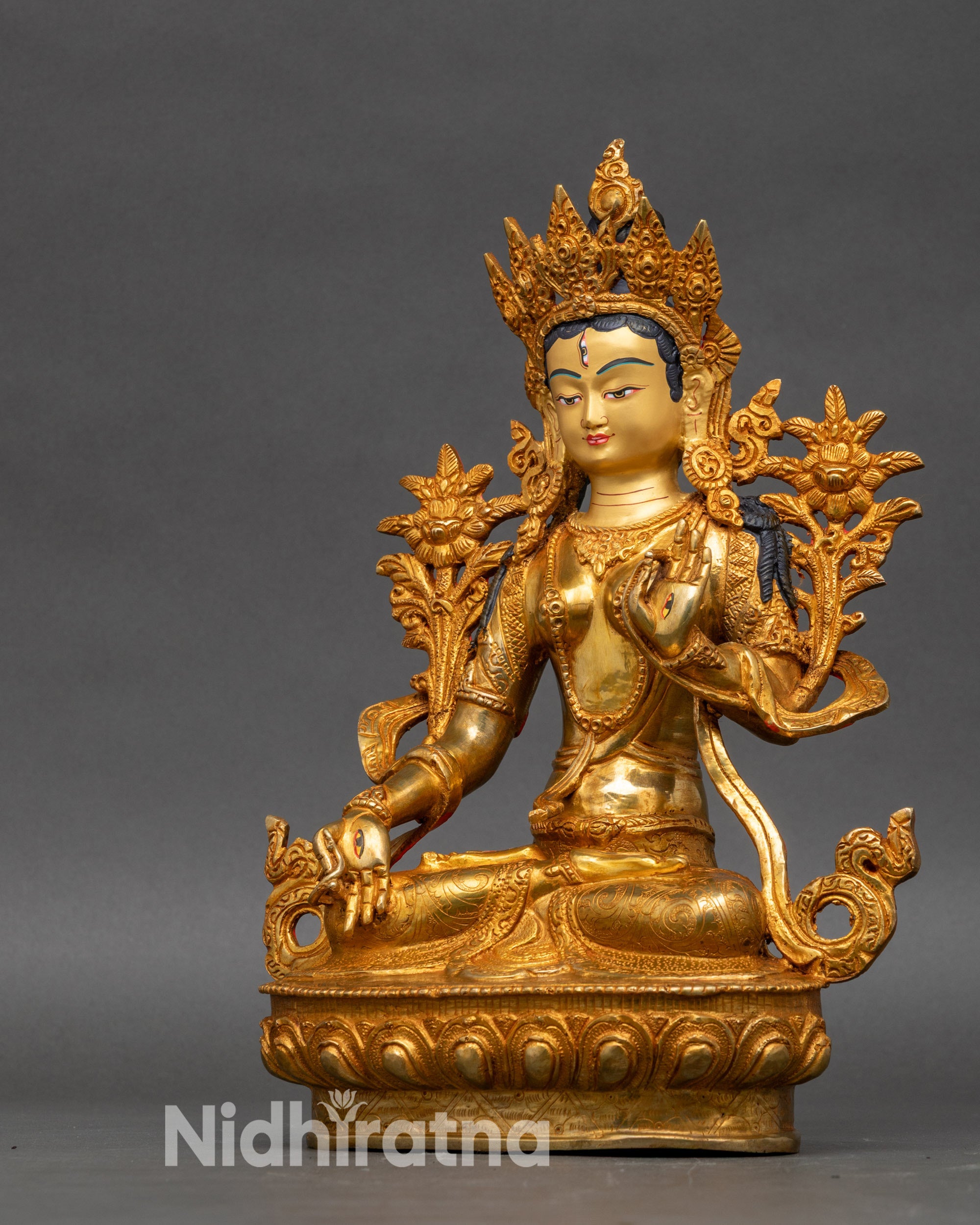 Handcrafted Nepalese White Tara figurine on lotus pedestal, gold fire-gilded finish