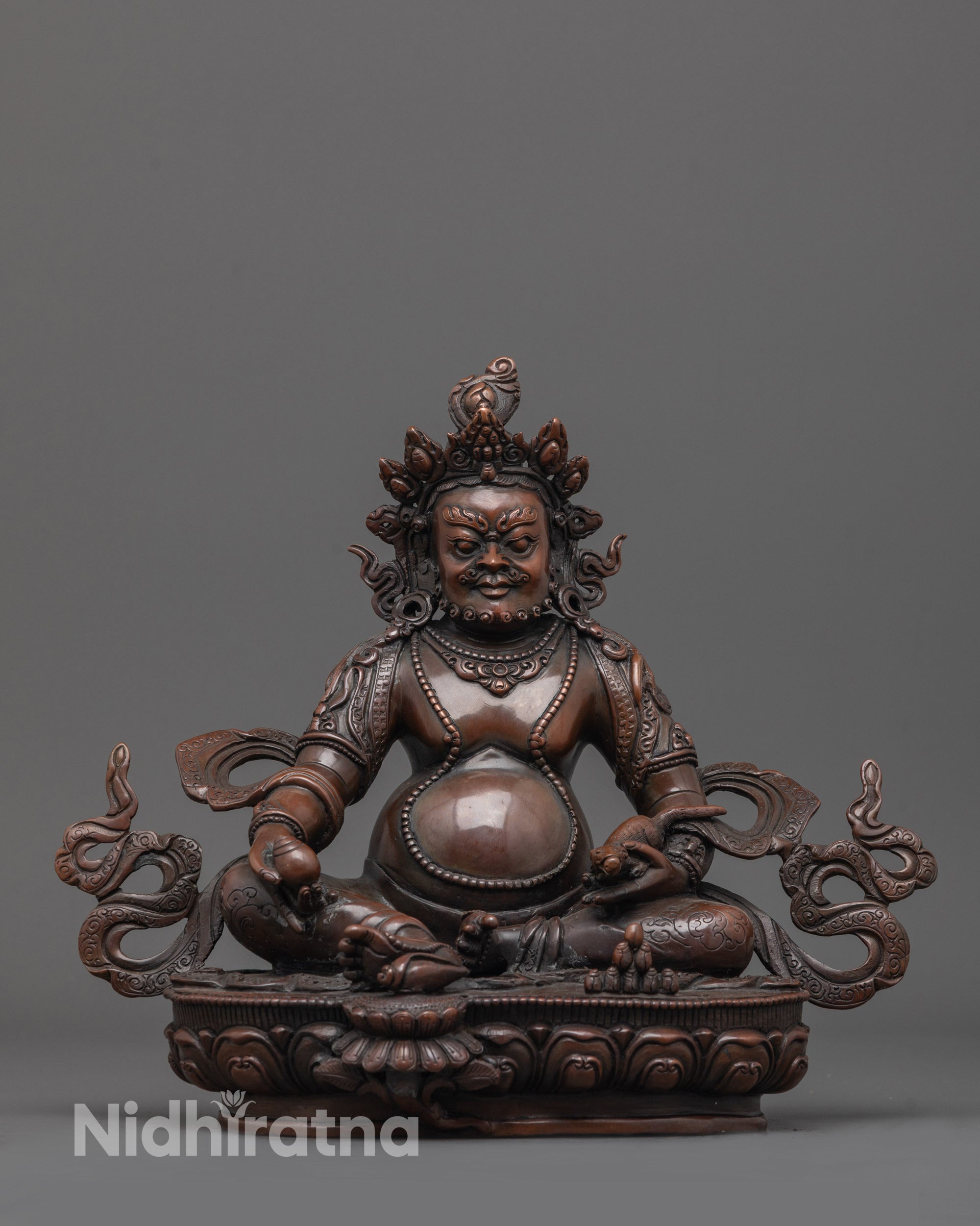 Handcrafted Oxidized Dzambhala Statue front view with jeweled crown and lotus seat details